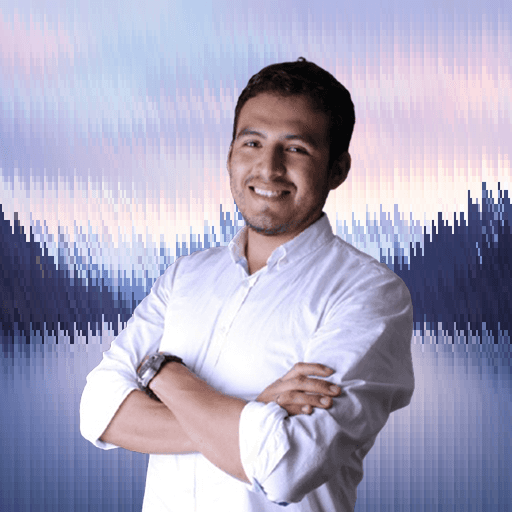 Professional portrait of a man with folded arms against a soft gradient background.