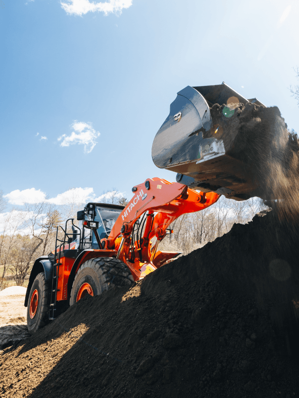 Price Landscape and Construction large machine loading dirt
