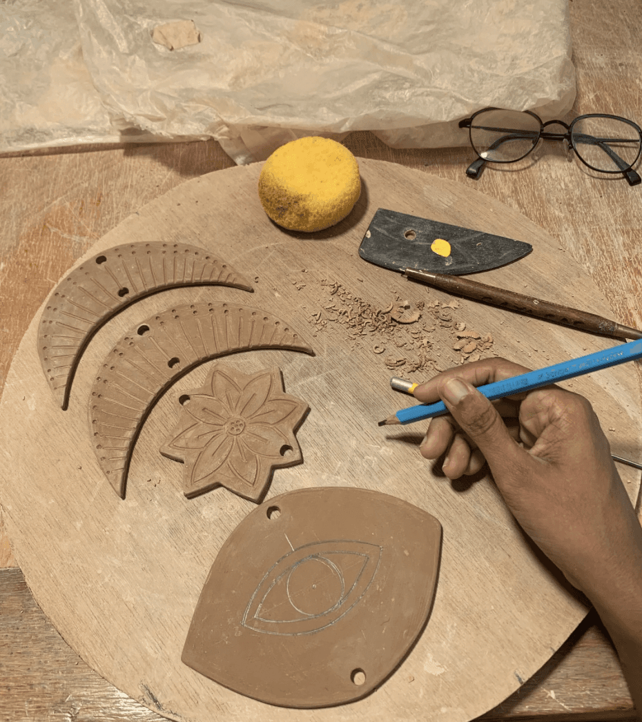 A man playing a drum in front of a group of people
