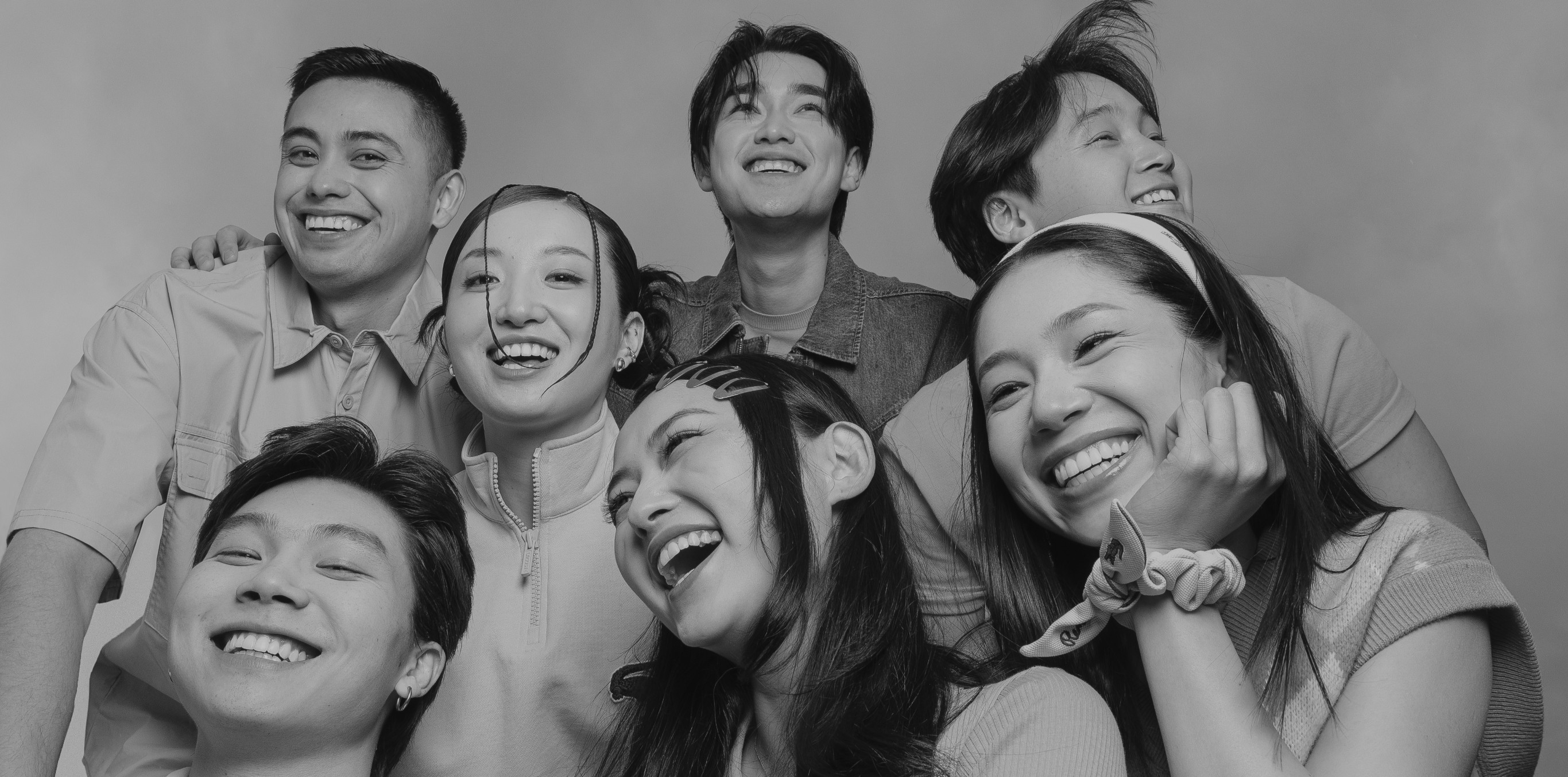 people sitting on chair in front of laptop computers