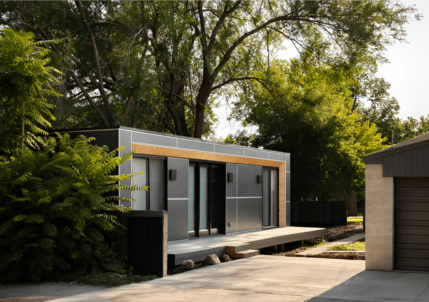 Modular home inn a backyard.