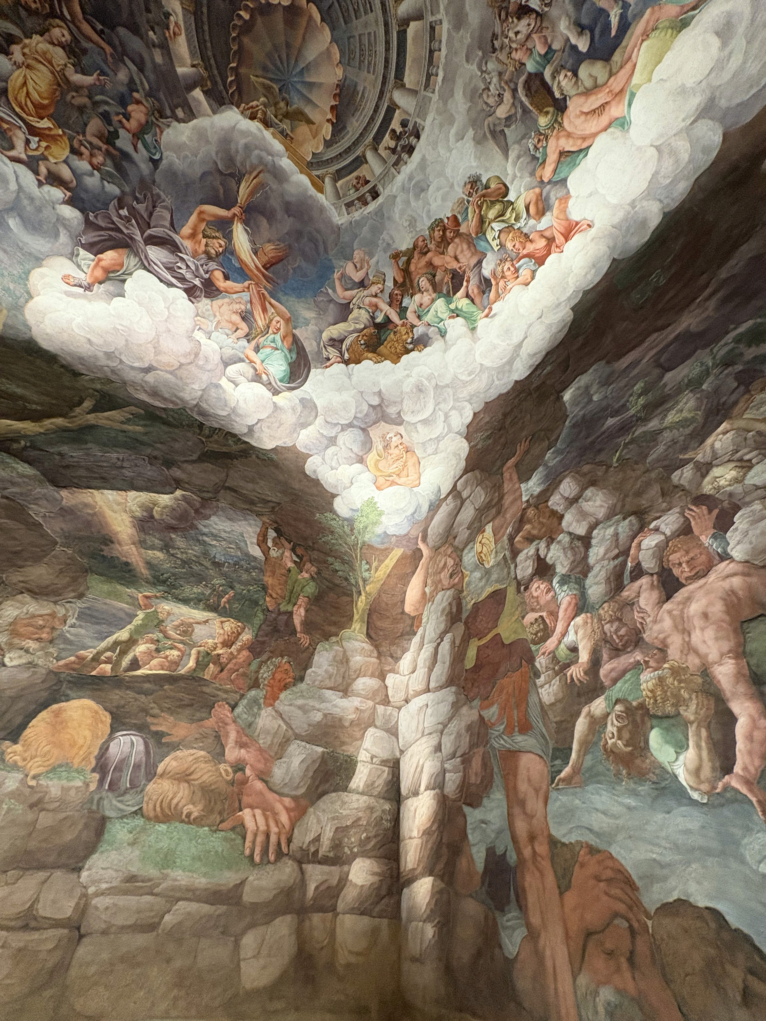 A grand fresco depicting a dramatic sky with angels and figures, full of vibrant colors and dynamic scenes.