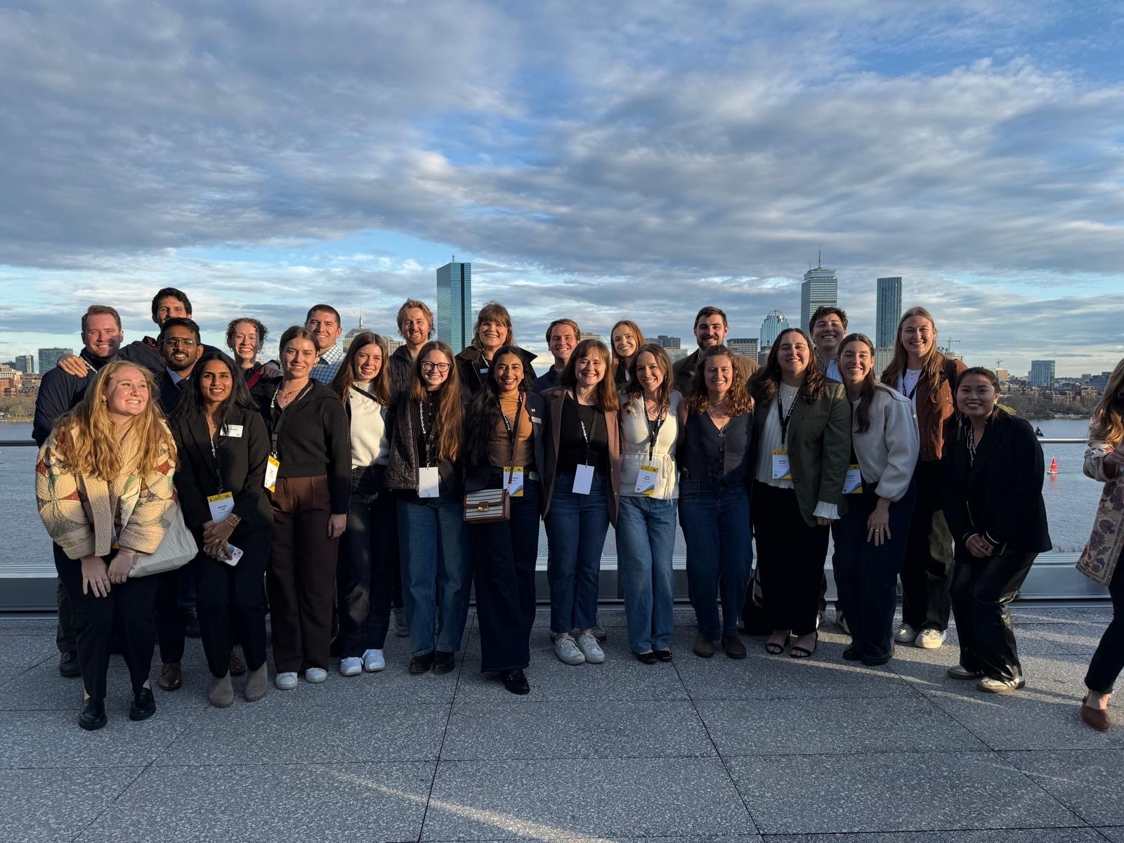A group of Erbers pose with a dramatic sky behind them