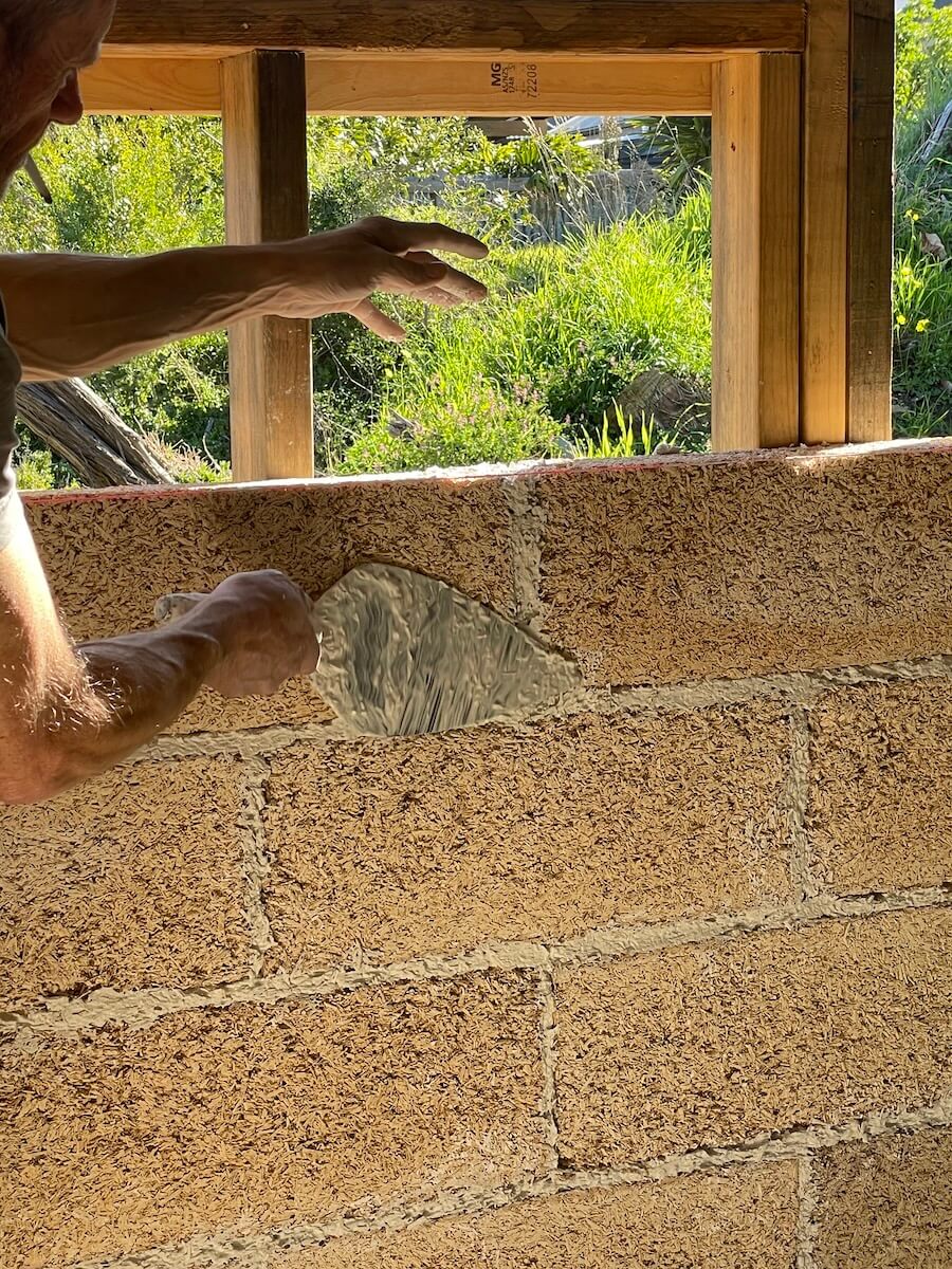 Hemp block getting installed switly by a local bricklayer