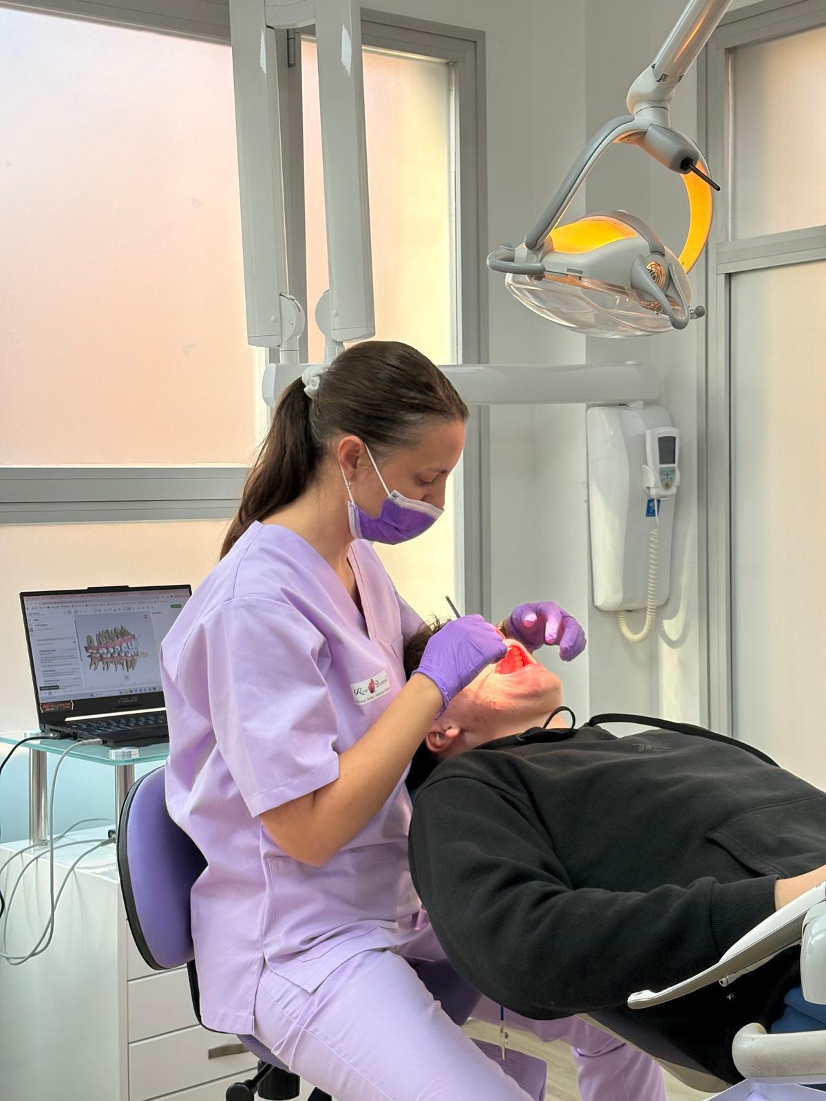 KUANTAN, Malaysia (Sept. 10, 2023) – Lt. Cmdr. Wilson Jing, Pacific Partnership 2023 dental team, conducts a dental exam at a community health fair at Kuantan City Mall during Pacific Partnership 2023, Sept. 10. Now in its 18th year, Pacific Partnership is the largest annual multinational humanitarian assistance and disaster relief preparedness mission conducted in the Indo-Pacific. (U.S. Navy photo by Mass Communication Specialist 1st Class Kegan Kay)