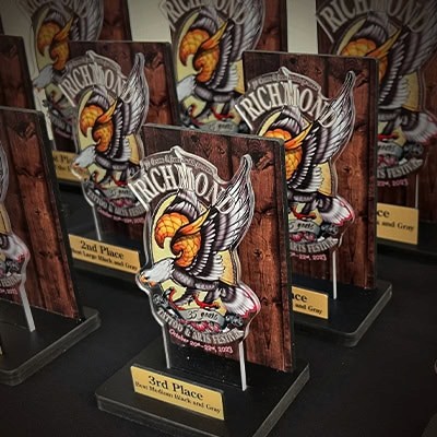Photo of eagle trophies from past richmond tattoo and arts convention