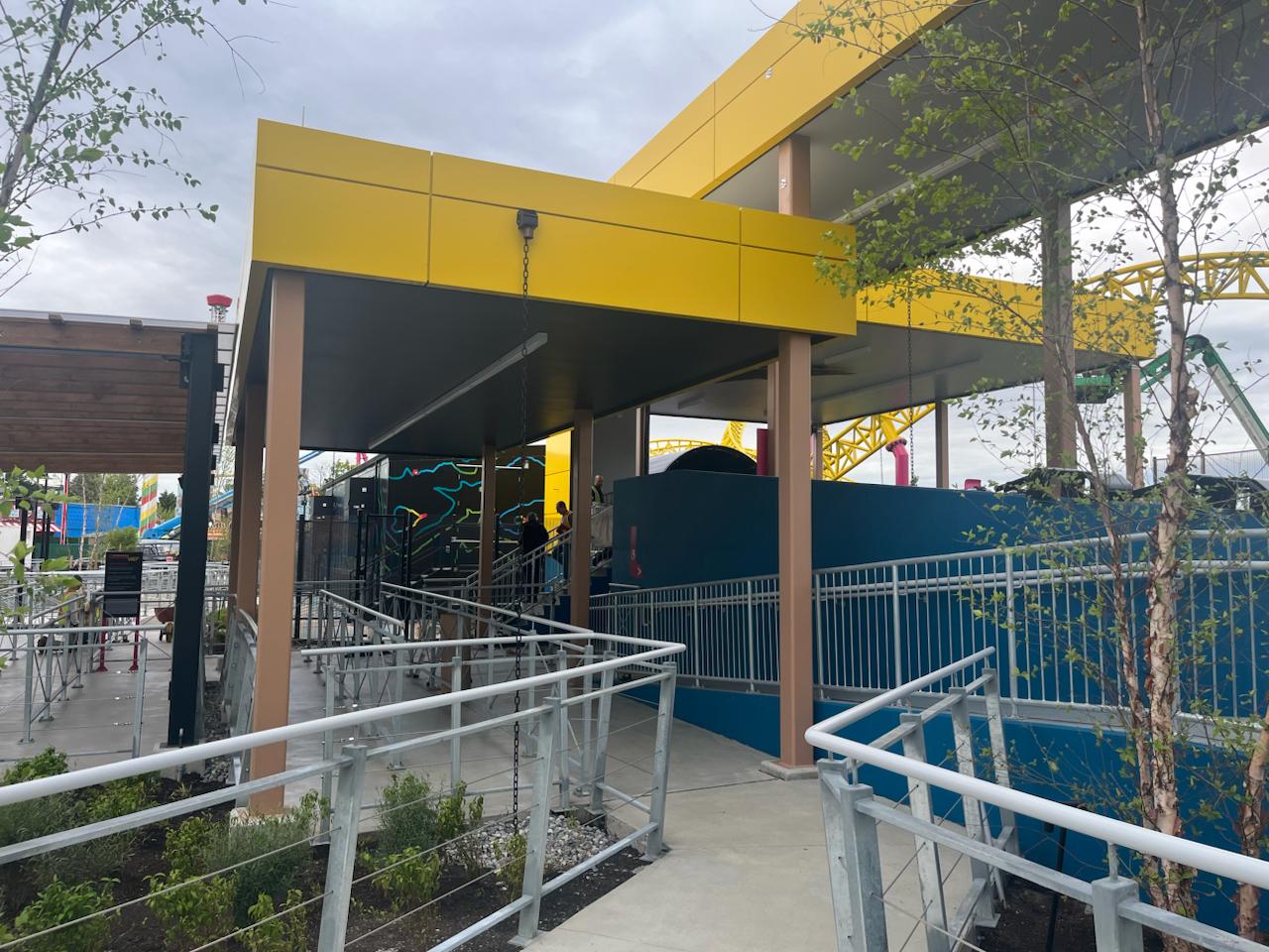 Completed covered walkway with steel columns and roof framing