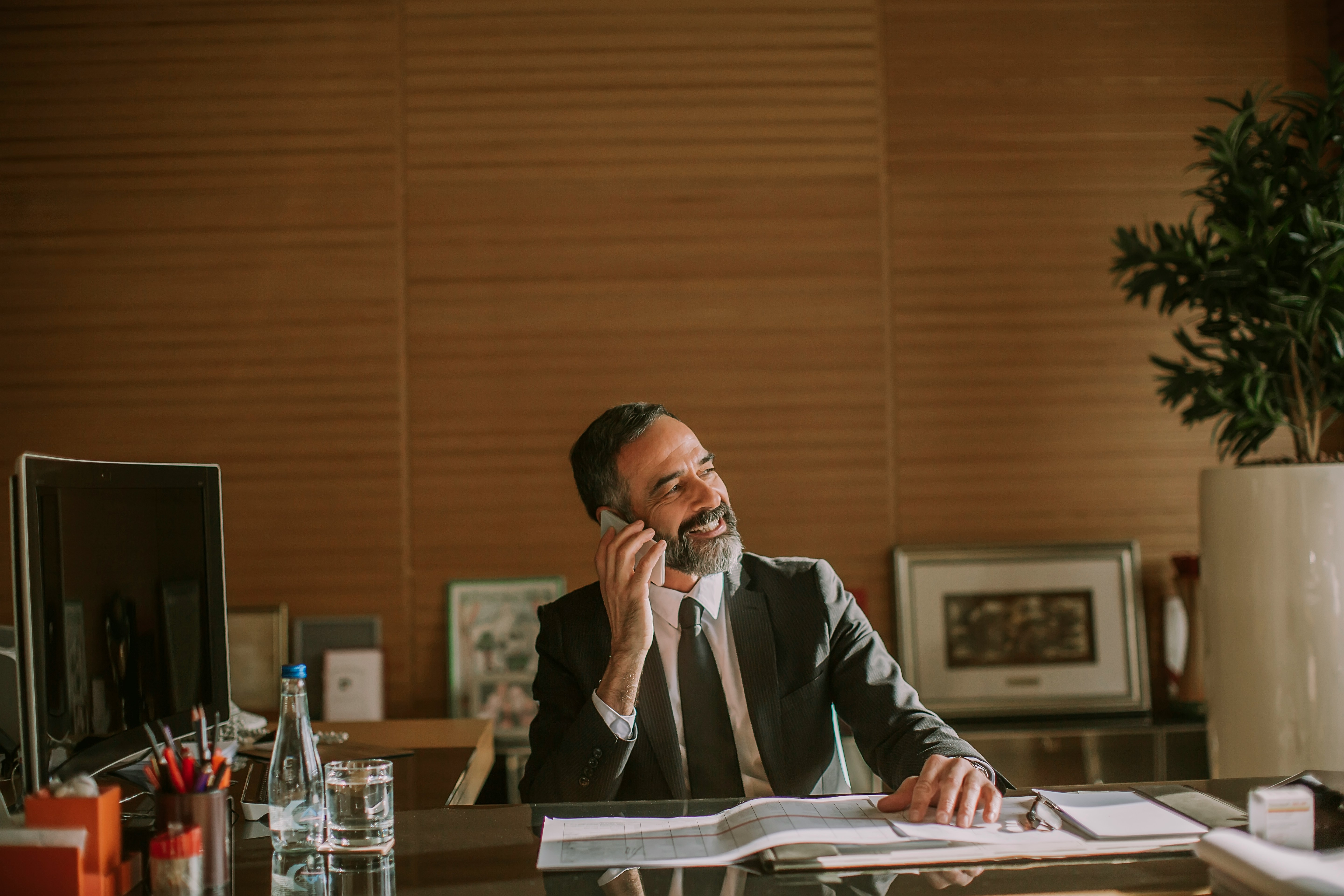 Russell-Cooke law firm website redesign by Cogworks – lawyer at desk