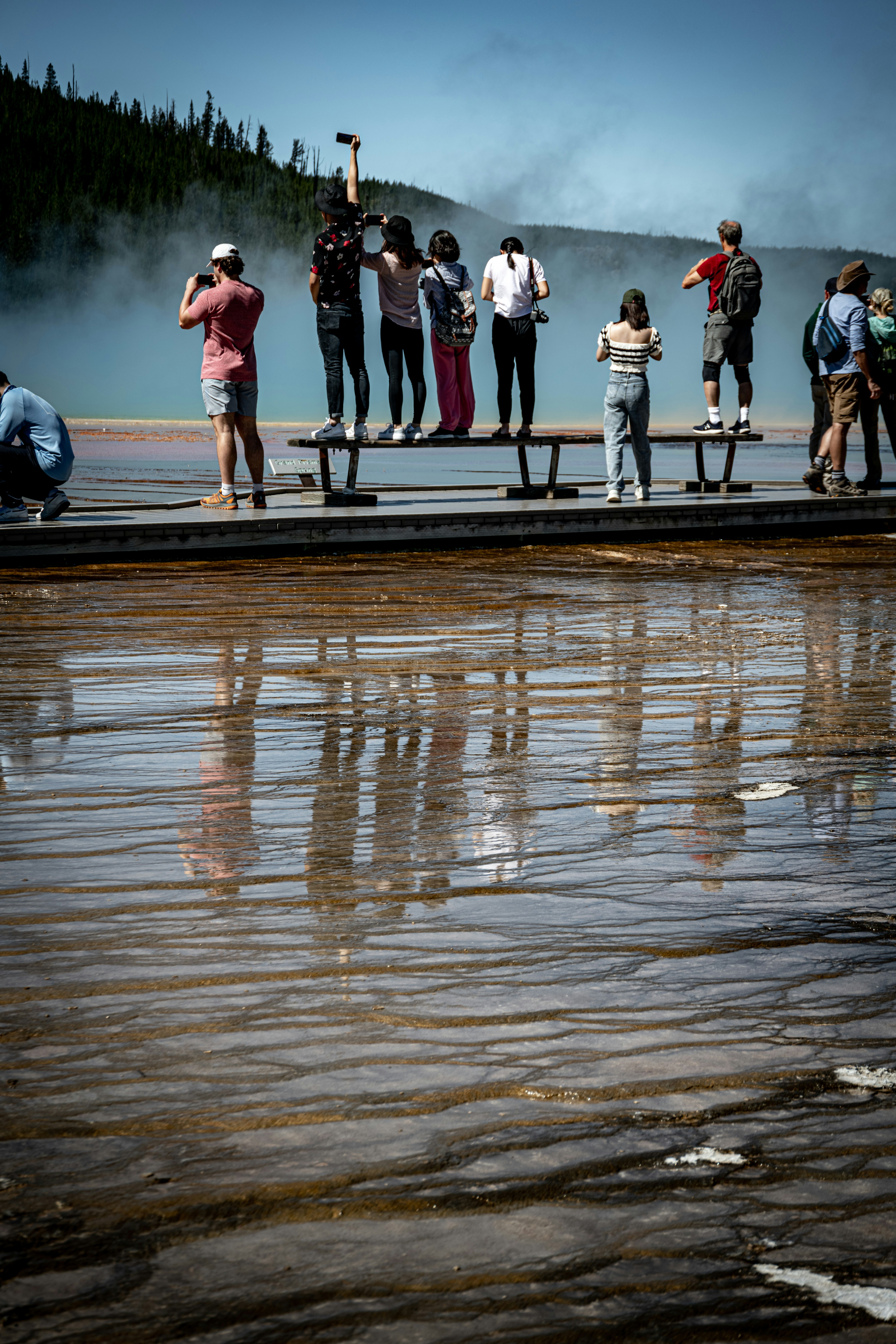 a group of people standing on a dock