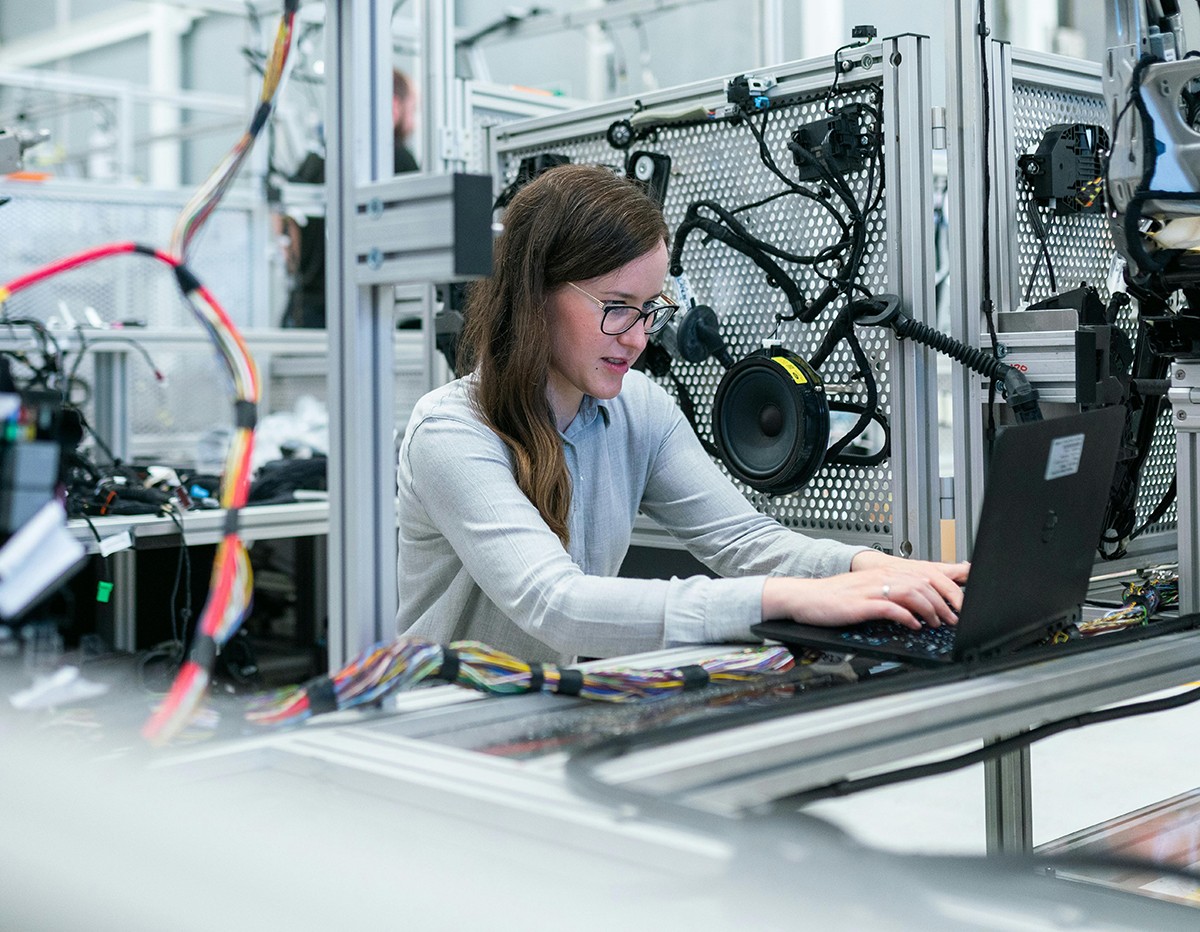 Female engineer working on a laptop computer