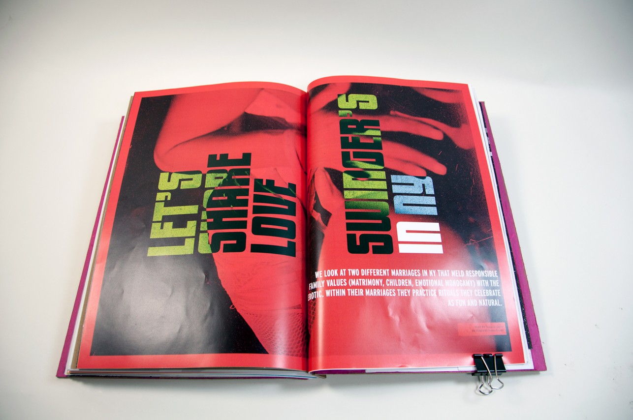 an opened book with a red illuminated photo coveting both pages on left and right, with the heading, let's share love swinger's in ny