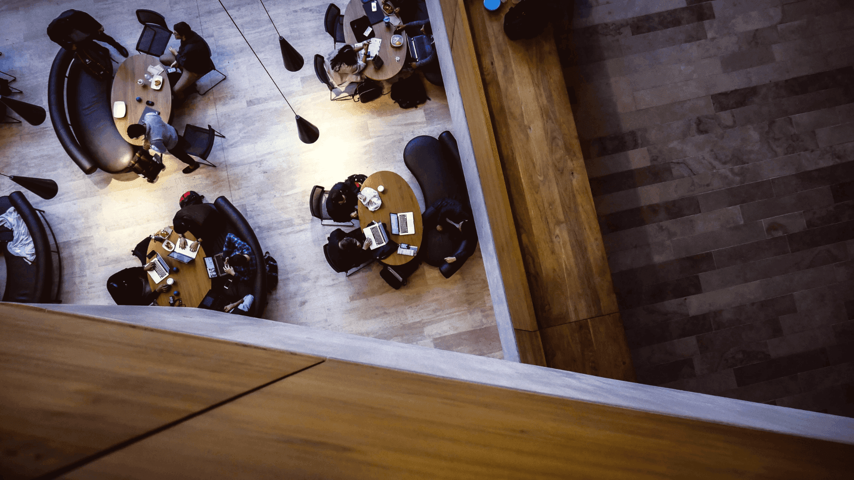 aerial photography of people sitting on chair