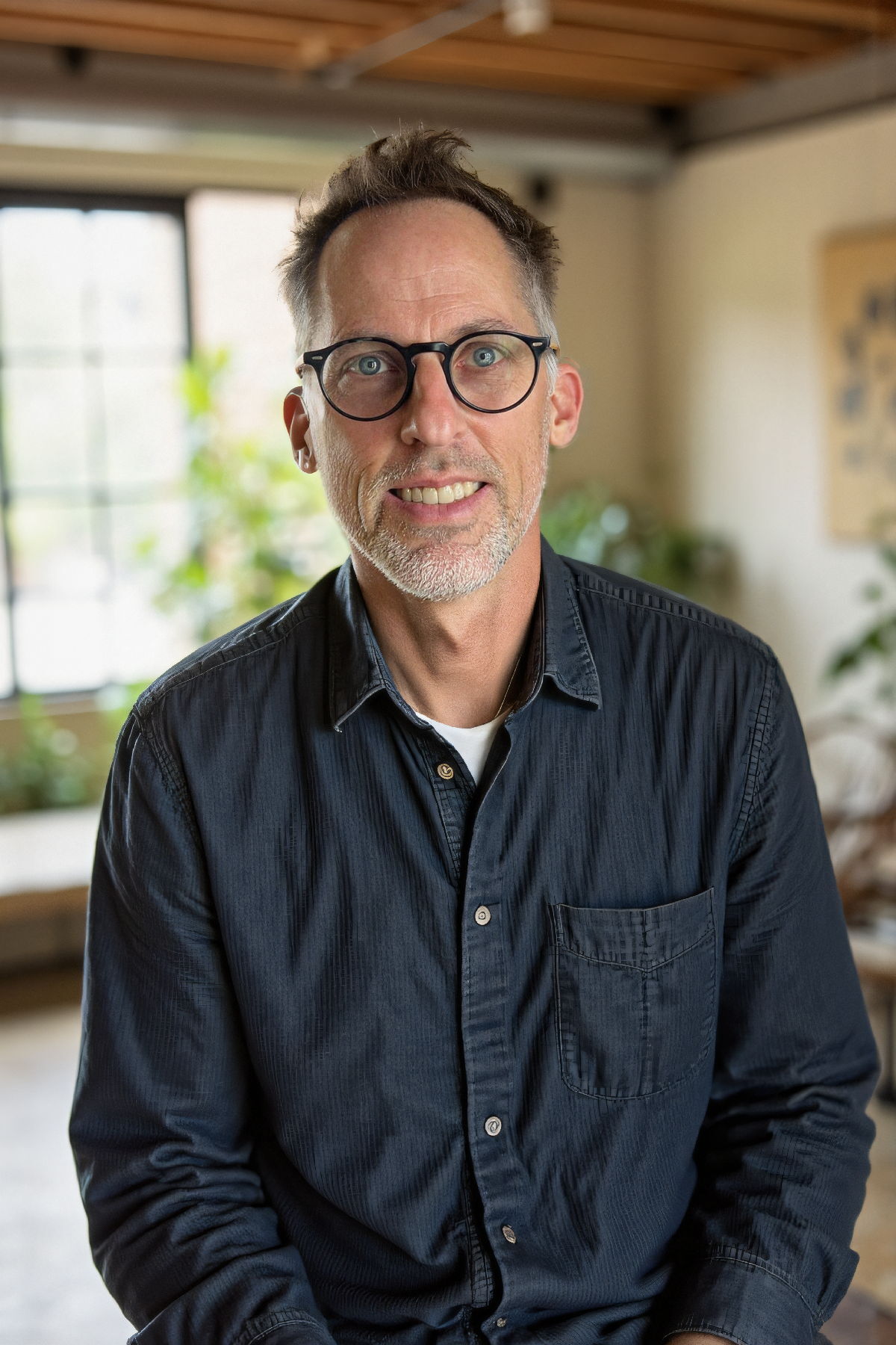 Portrait of a young man with glasses
