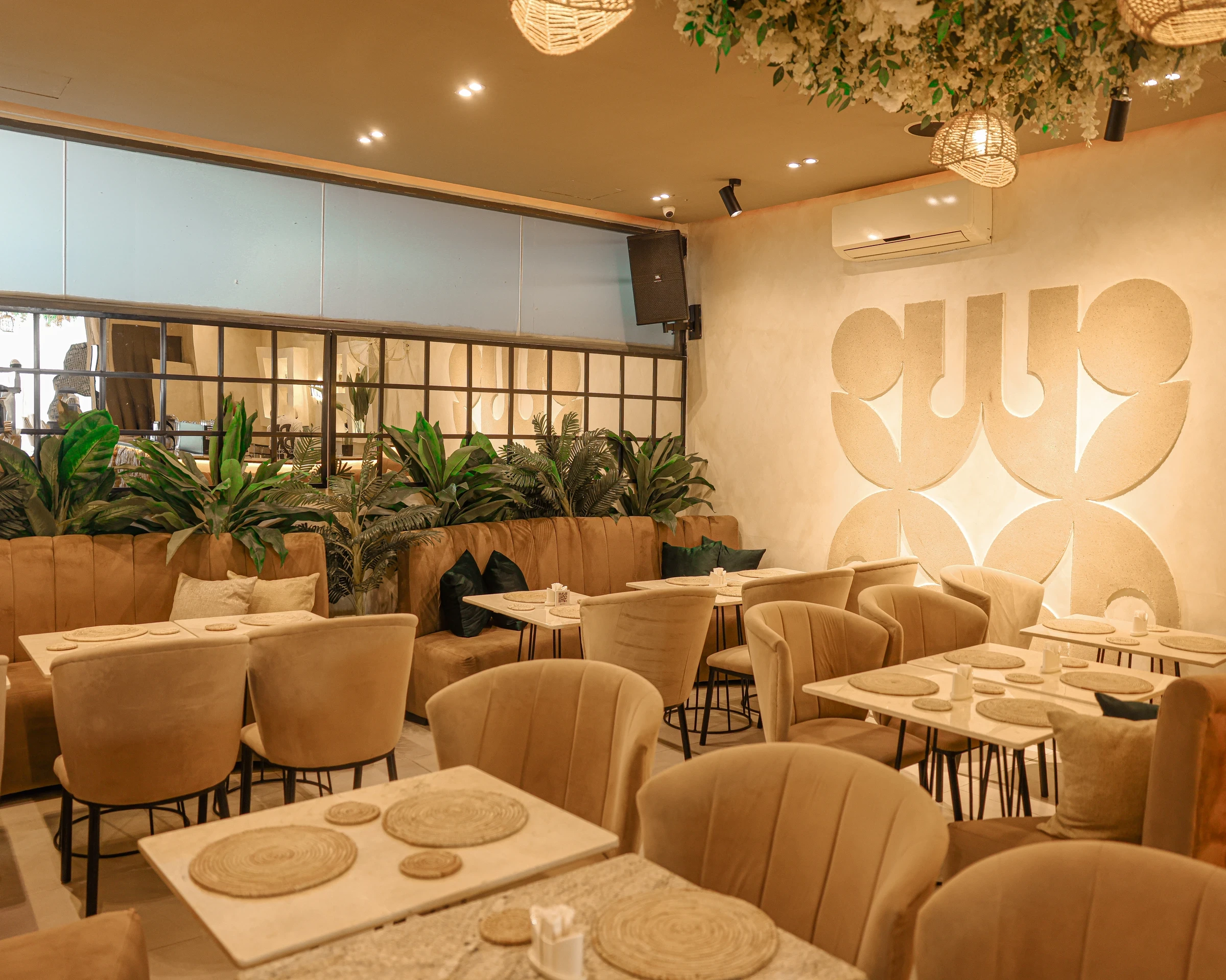 people sitting on chairs inside restaurant