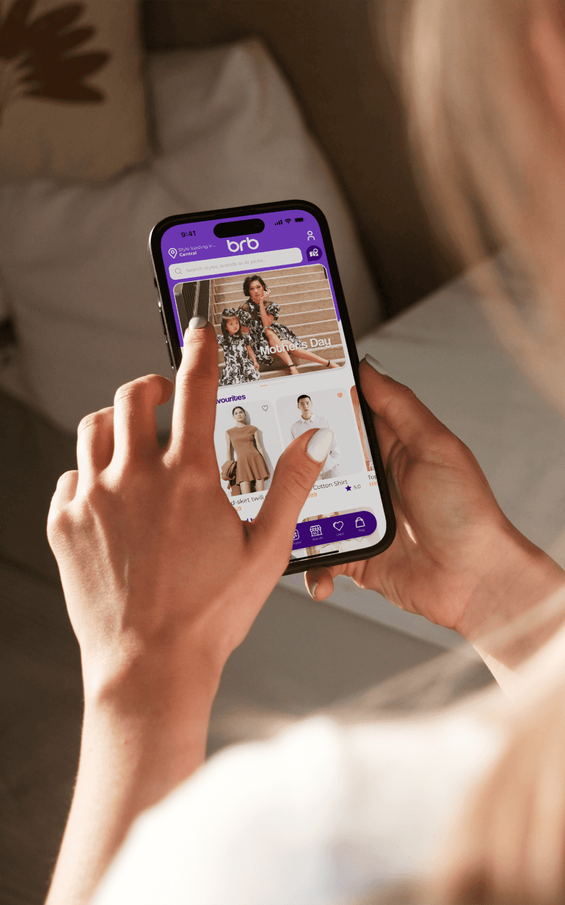 User browsing BRB app on smartphone to shop fashion and lifestyle items
