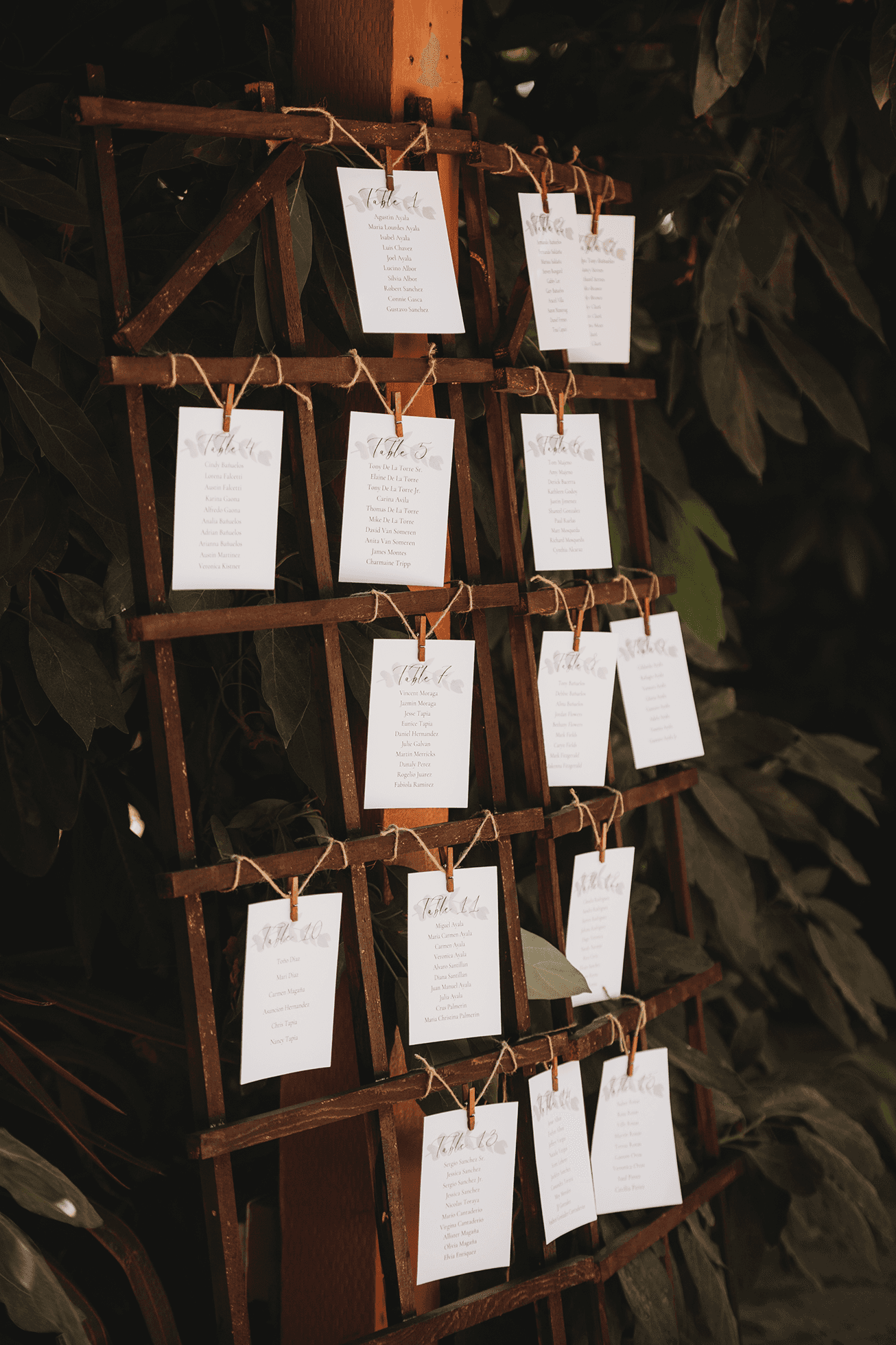 Flat lay wedding details with bouquet, rings, and sparkling bridal heels