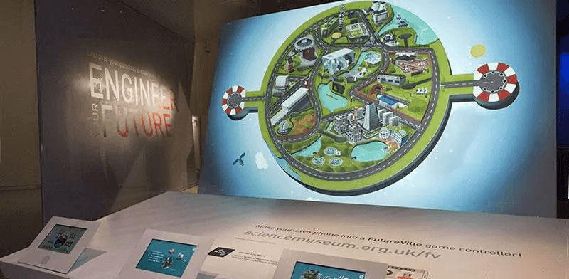 photo of an interactive game installation representing a green city