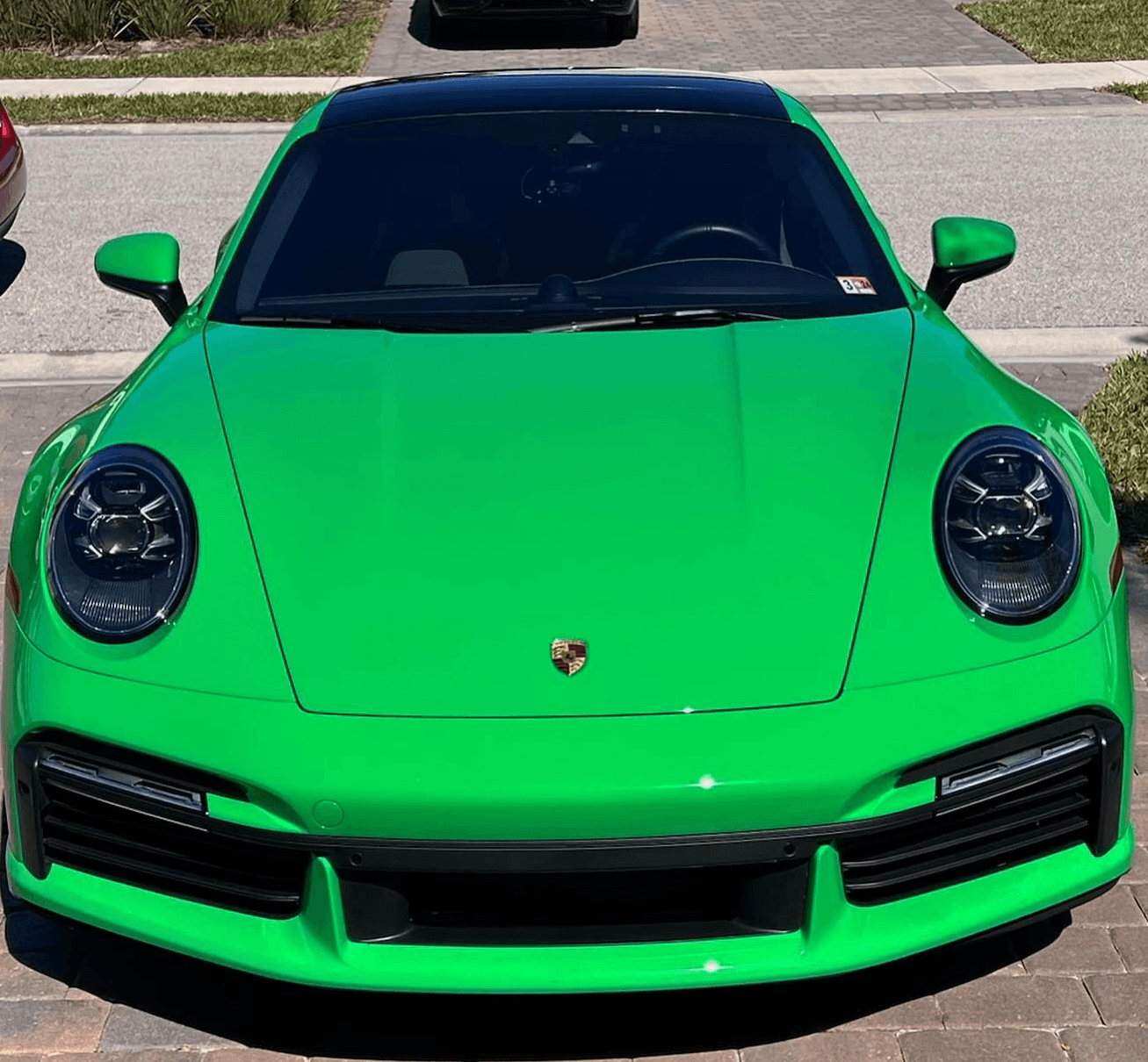 Green Porshe 911 detailed with a 6 month wax by gulfstream mobile detailng