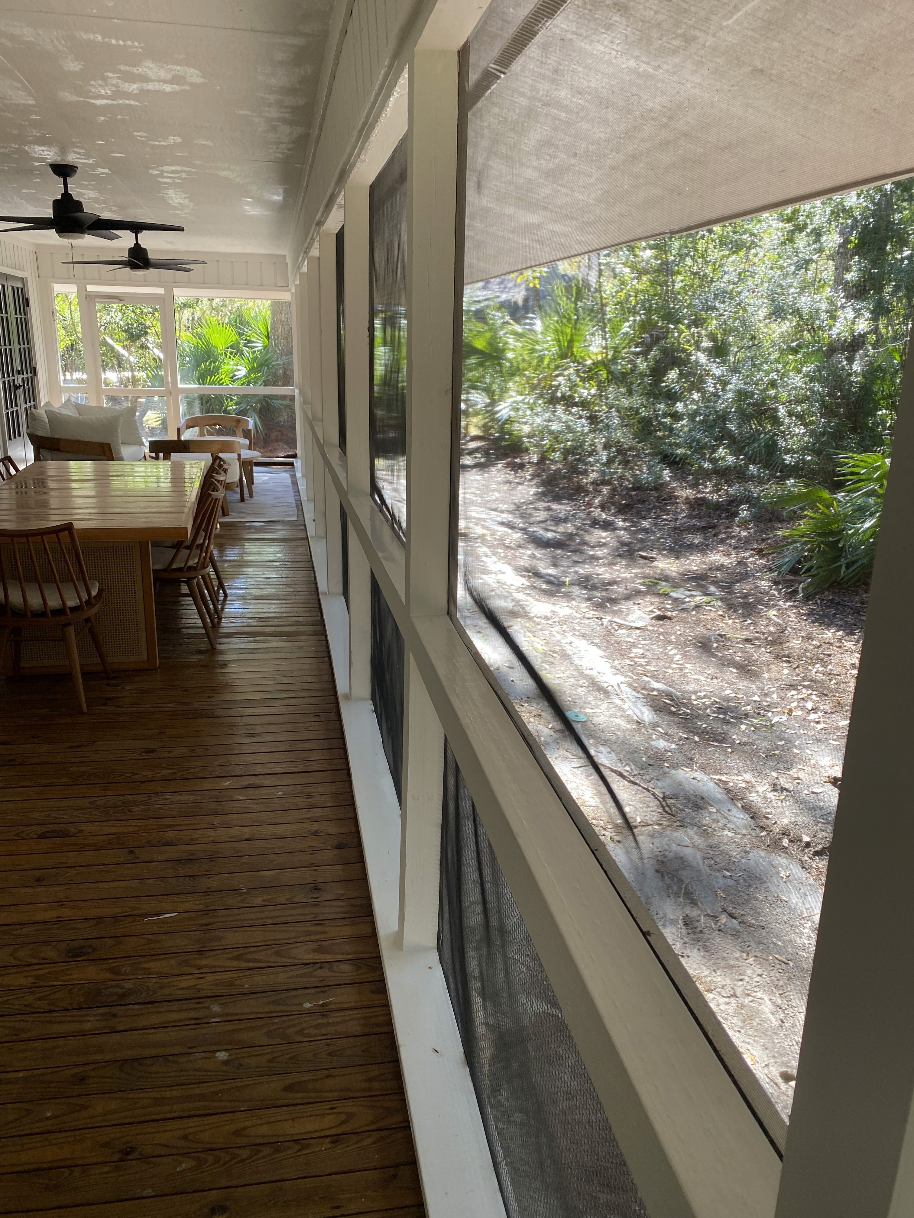 Window glass with hard water spots before cleaning service.