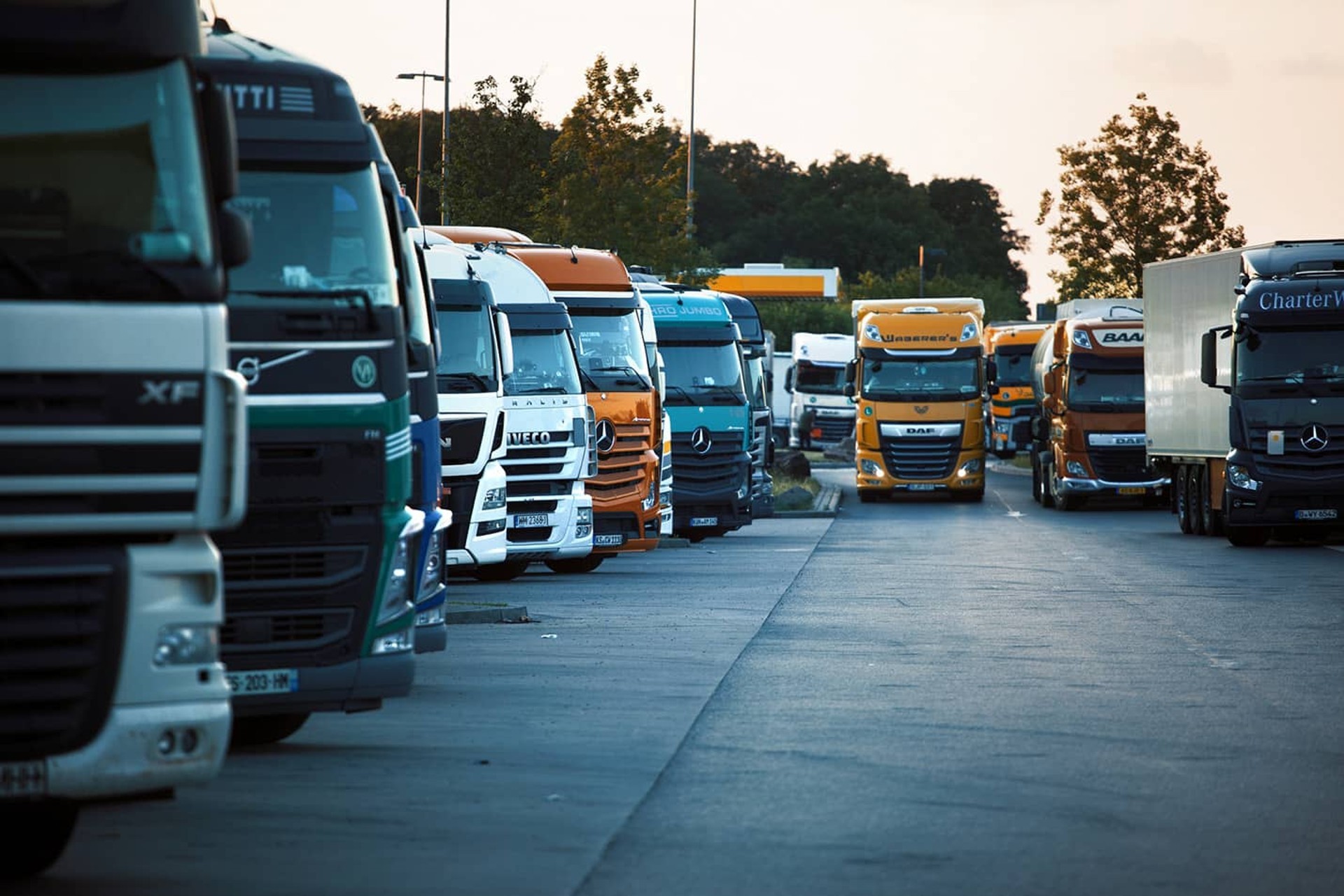 Secure truck parking facility with surveillance cameras, illustrating the importance of safety in truck parking.