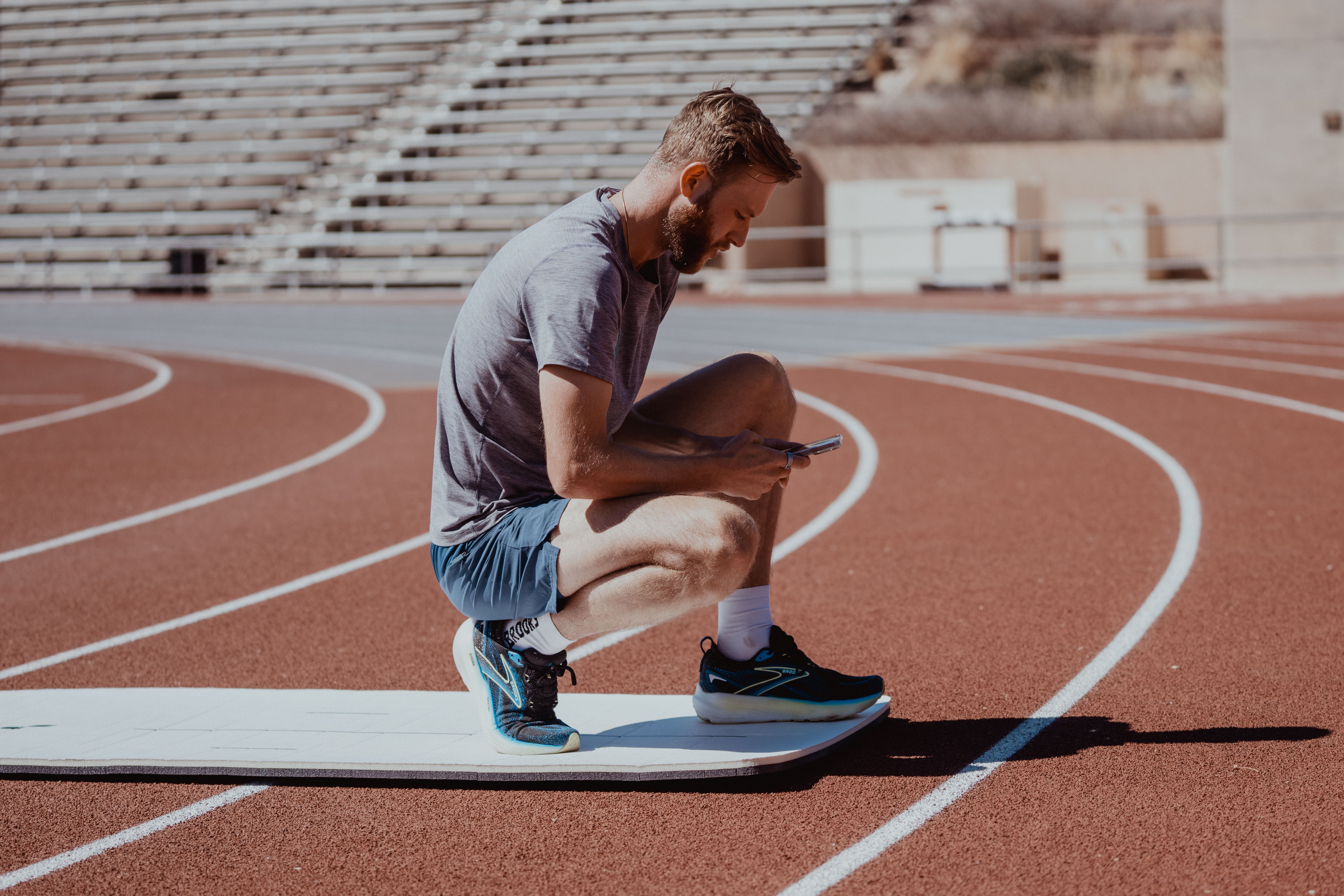 man on running tracks - Mid Back Stiffness
