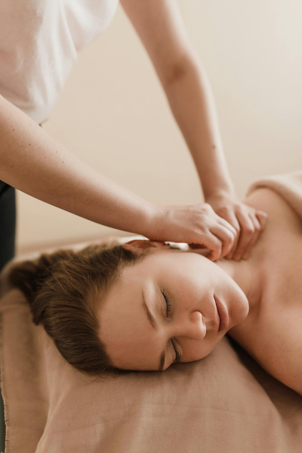 a girl relaxing on a massage bed