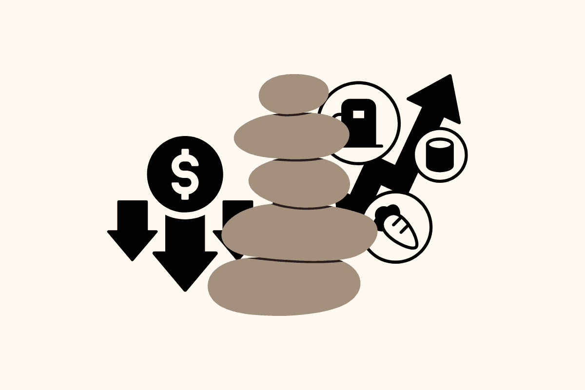 Gemini said An illustration symbolizing inflation and economic balance, featuring a central stack of five smooth, balanced stones. To the left, a dollar sign icon is positioned above three downward-pointing black arrows, indicating a decrease in currency value. To the right, icons for fuel, canned goods, and a carrot are positioned along a jagged upward-pointing black arrow, representing the rising cost of essential goods.