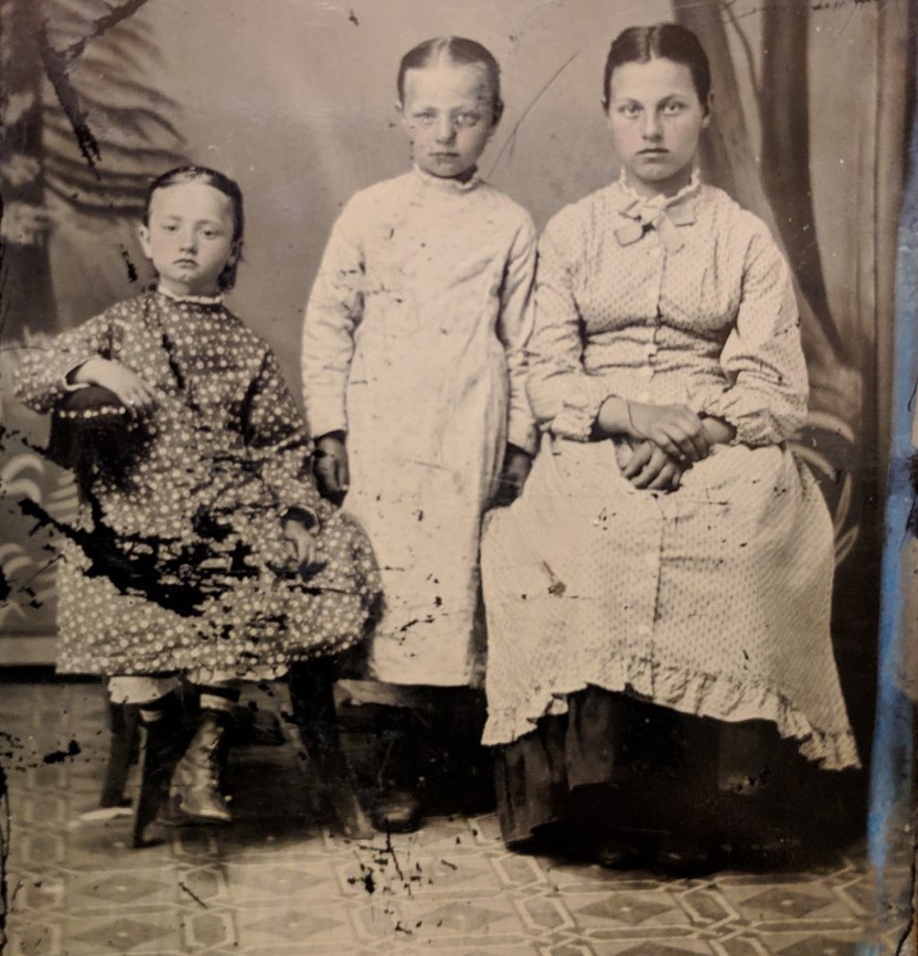  Christine Johnson (left) with her sister (middle) at the Norwegian Settlement at Mondovi, Wisconsin, ca. 1879. 