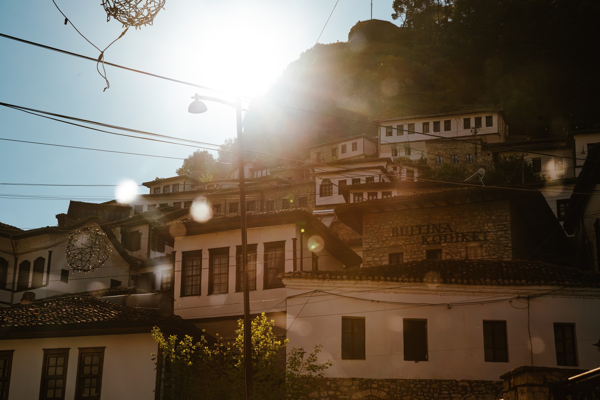 TRAVEL — Evening light over a hillside town.