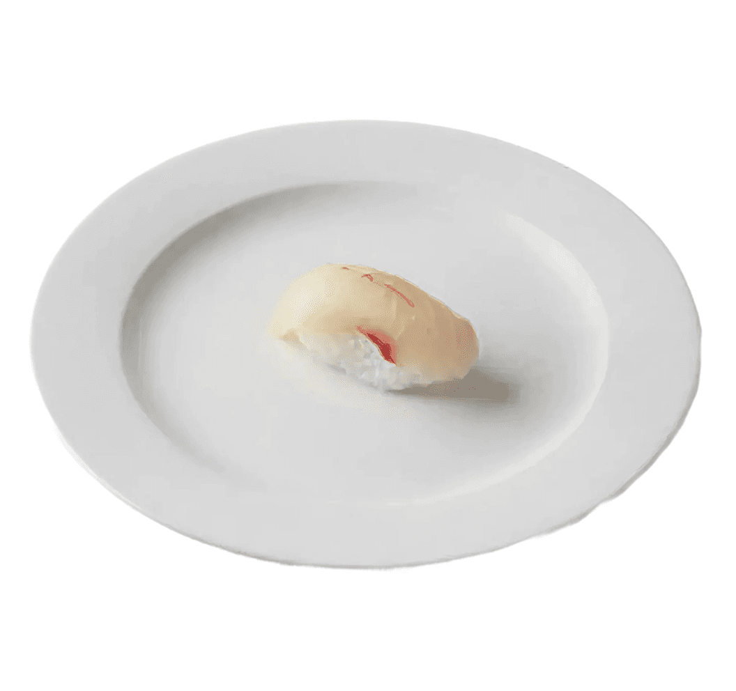 Delicious wrapped sushi on a white plate in a white background