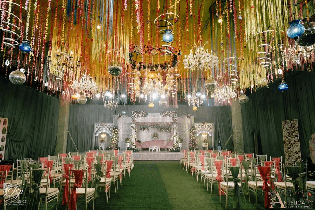 Elegant wedding reception venue decoration and floral stage setup in Dhaka