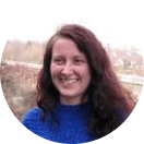 a man wearing glasses and a black shirt