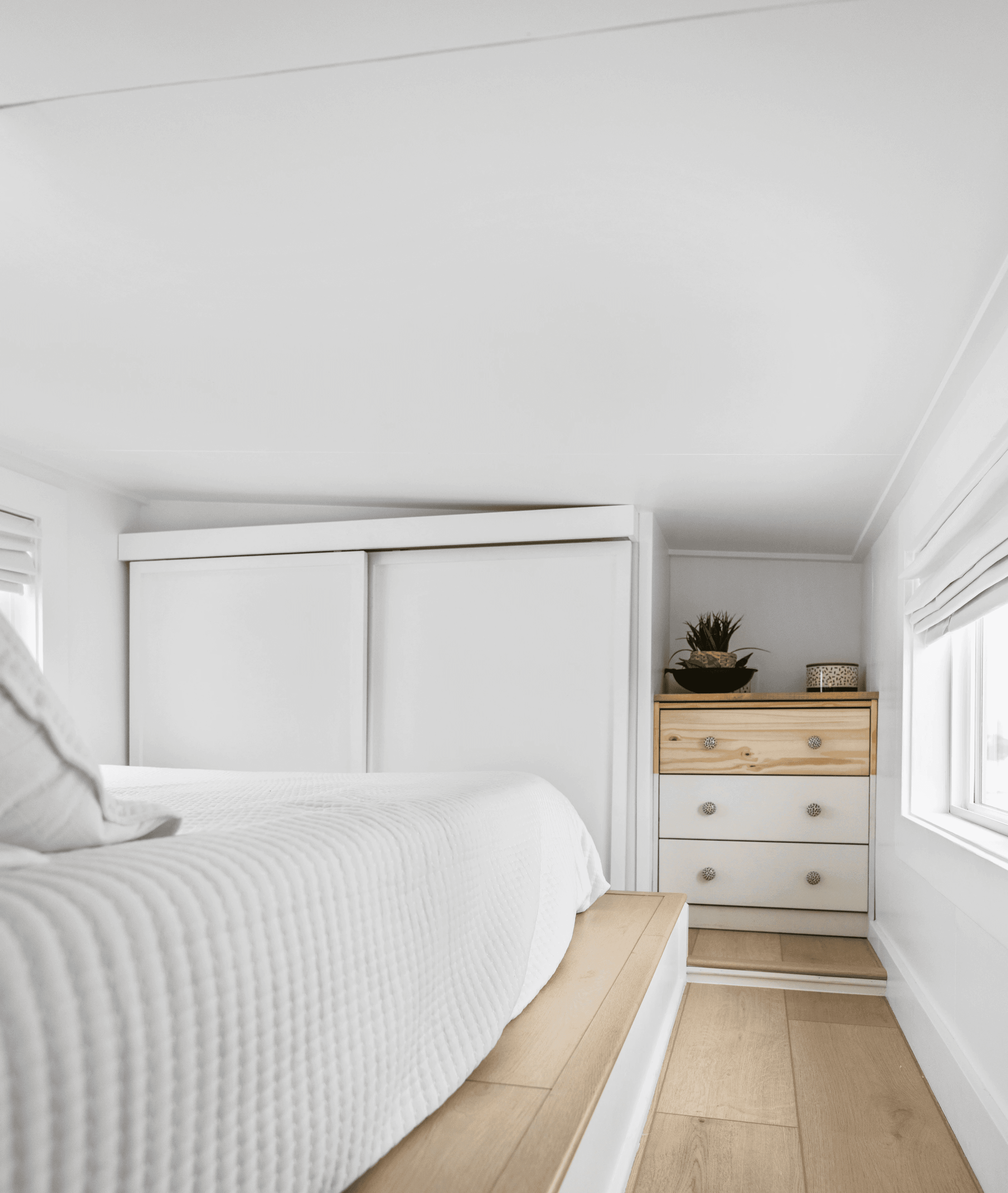 Living area with complete wood accent wall and warm, vintage 70s style in Southern Utah
