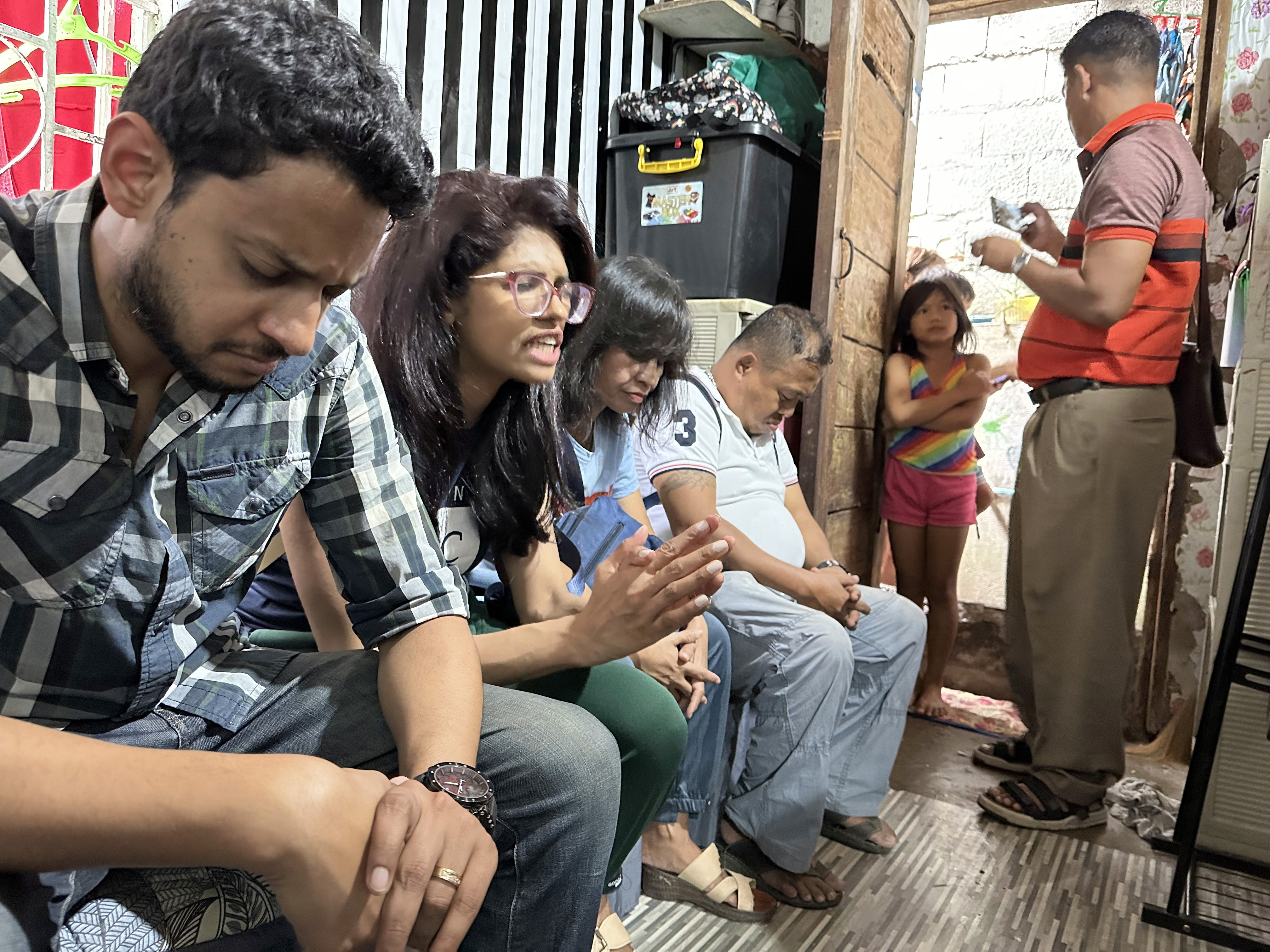 a man and woman kissing