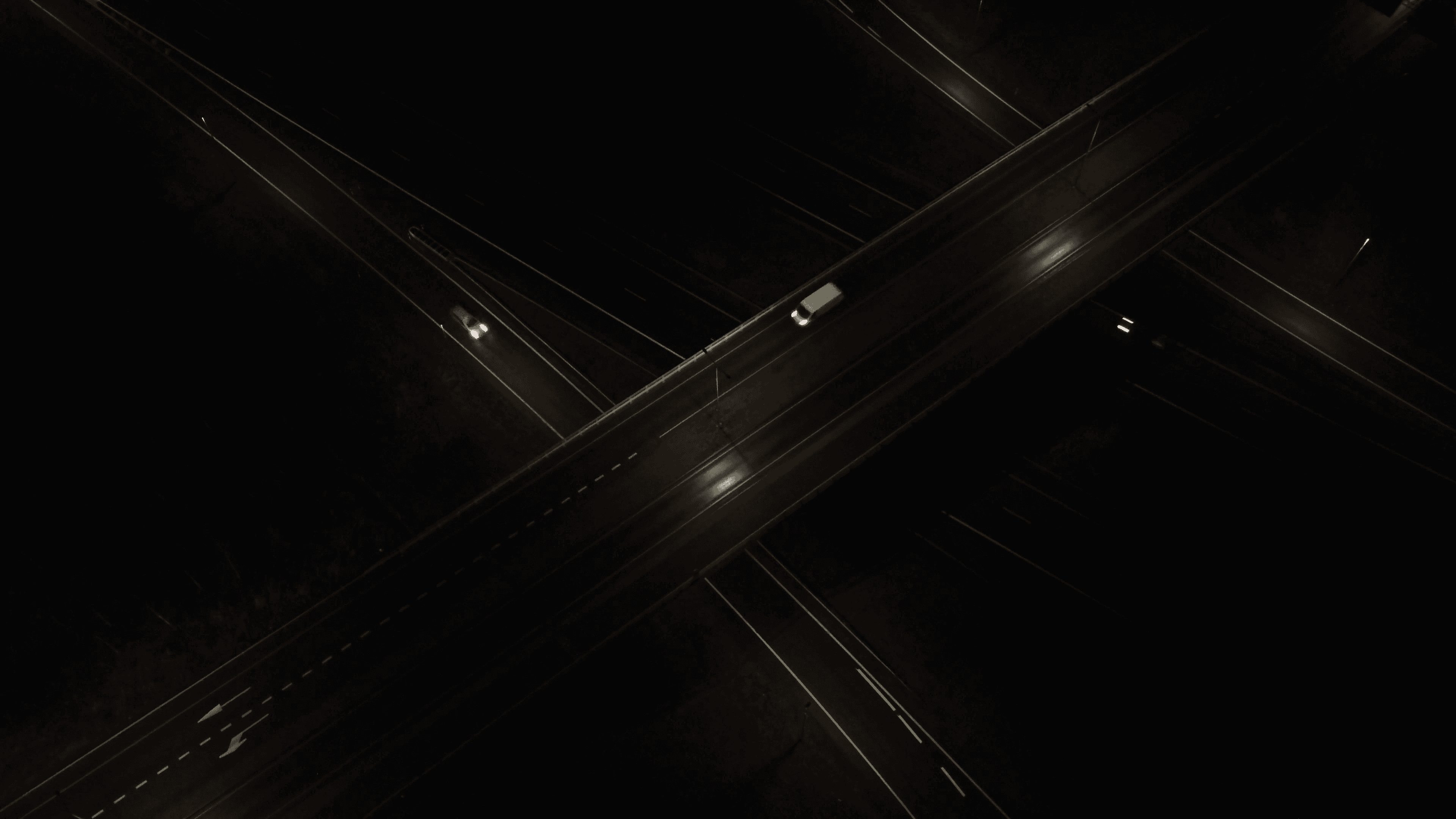 black truck on road during daytime