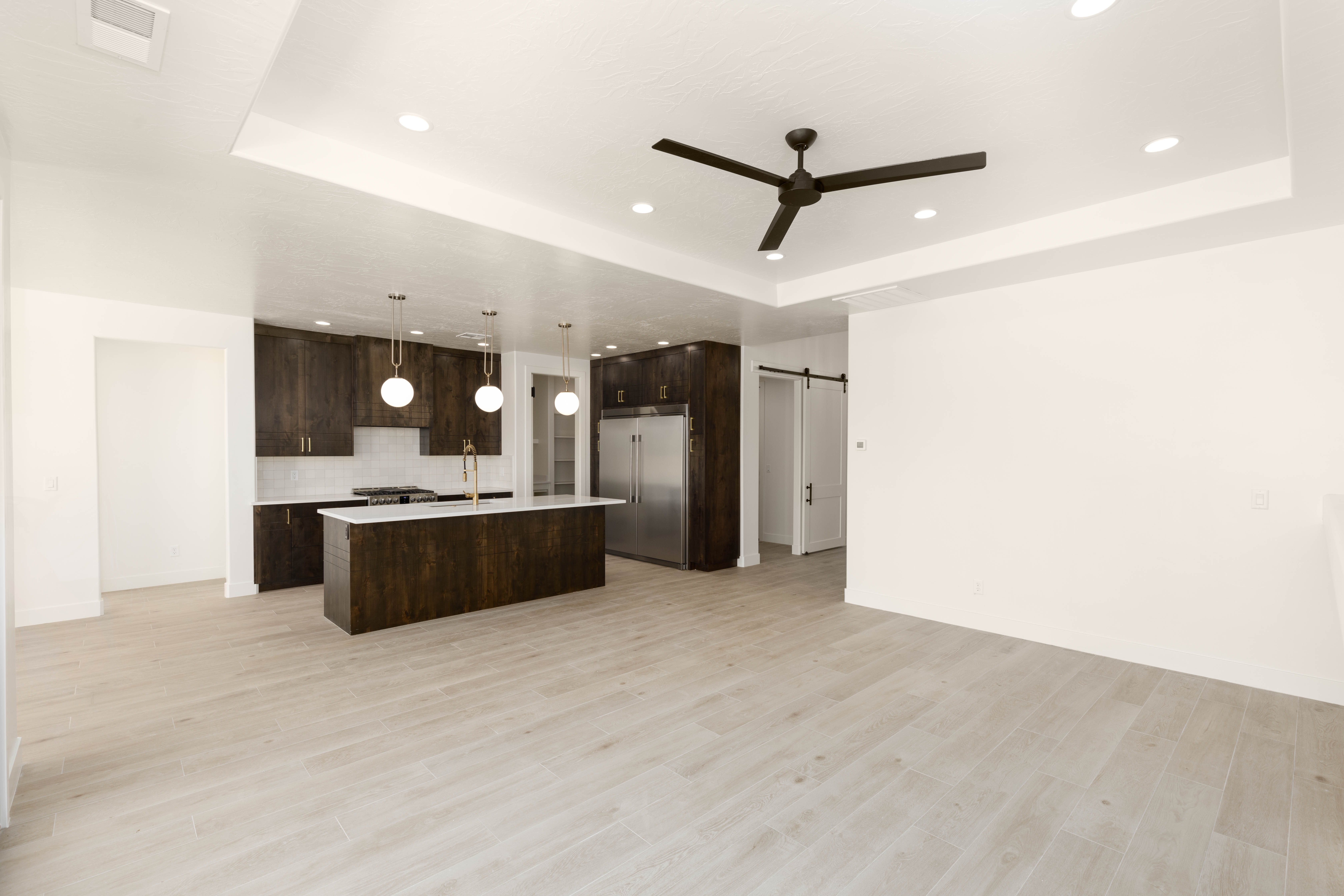 Modern kitchen in The Meridian home in Hurricane Utah with clean finishes and open concept layout.