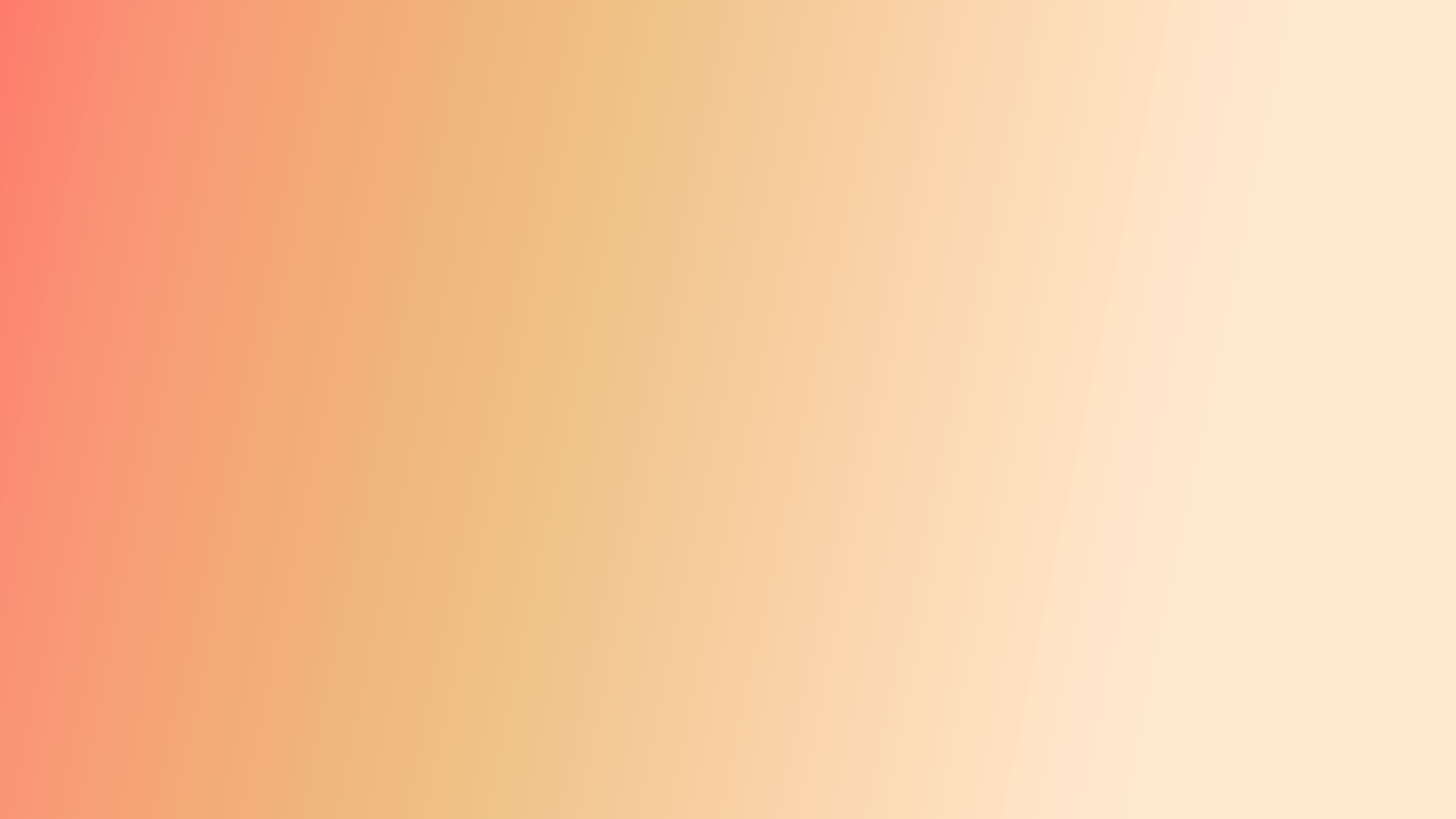 woman in blue tank top standing beside white wall