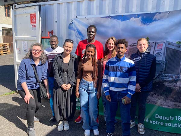 Groupe de visiteurs posant à la fin de la visite de l'Expo Digger.