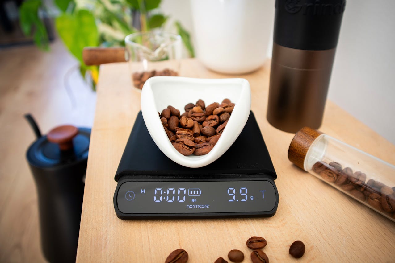 weighing specialty coffee beans for precise brewing