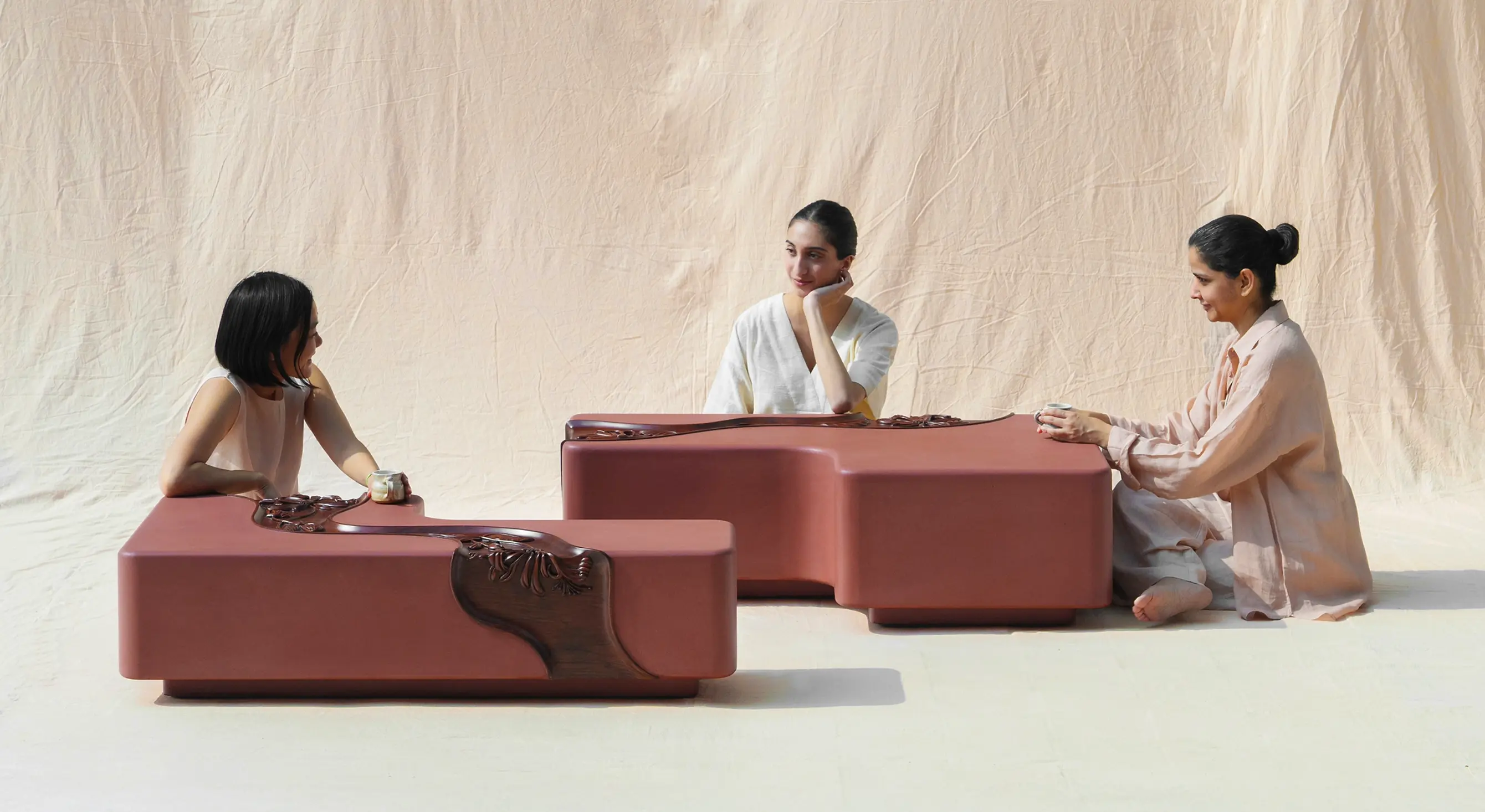 A group of women sitting around the conversation table