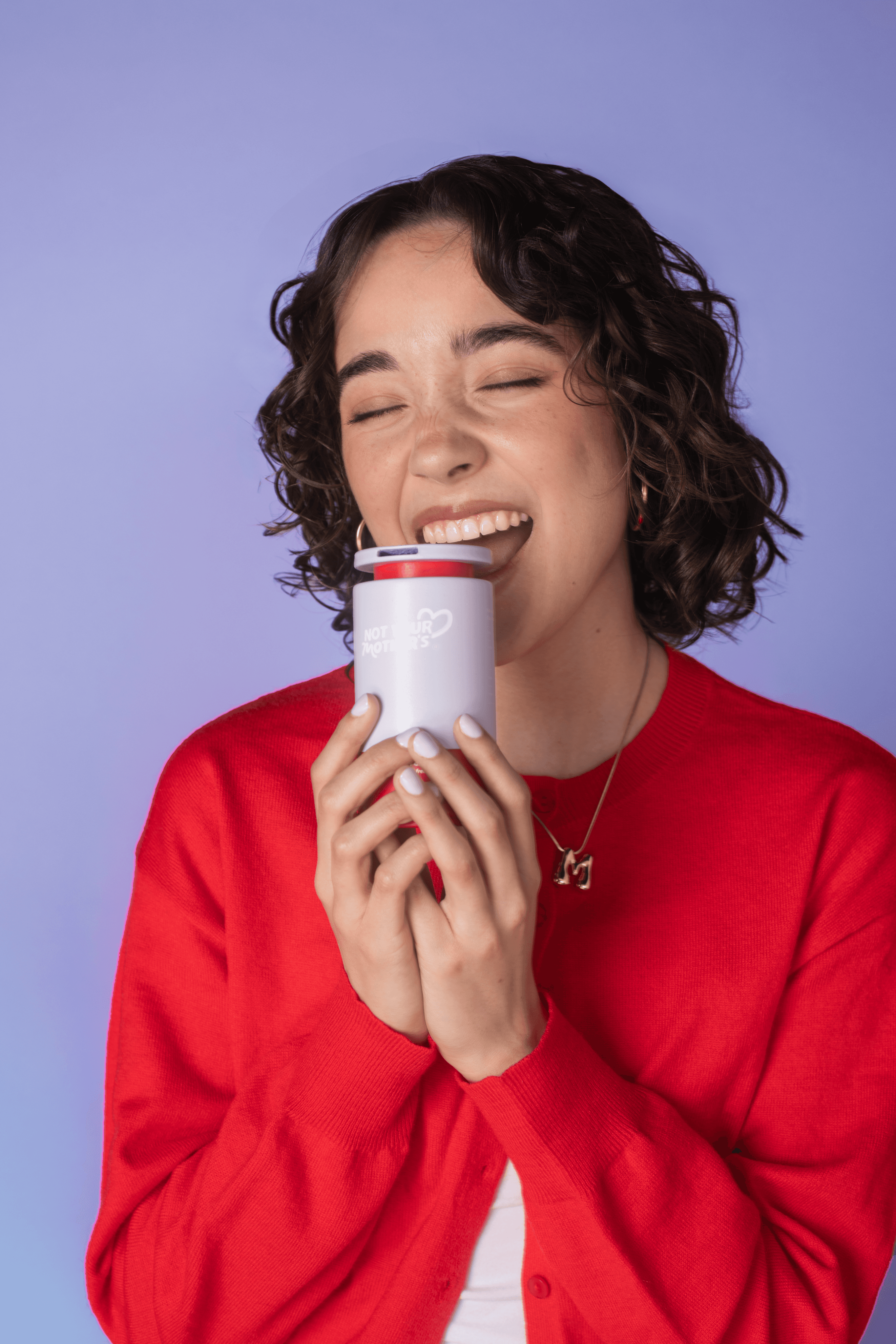 girl holding not your mother's product in hands