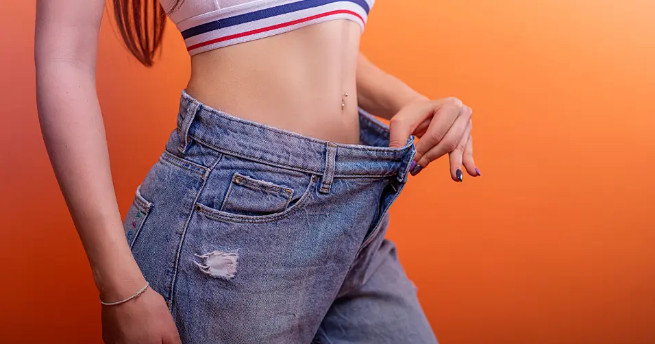 Caloric deficit is consuming fewer calories than burned to promote fat loss.