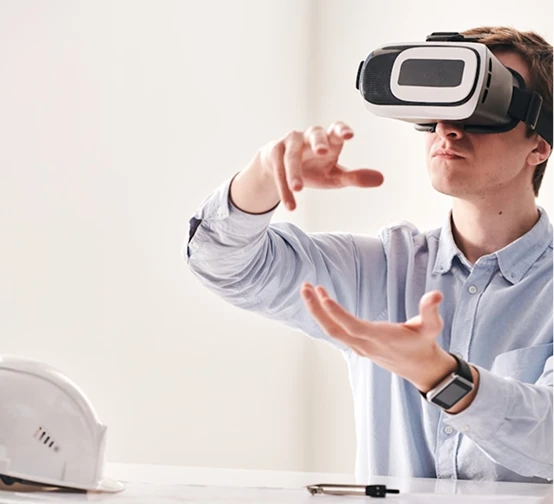 A person wearing a virtual reality headset interacts with a digital environment, embodying the forward-thinking ethos of Next-Wave Media & Entertainment.