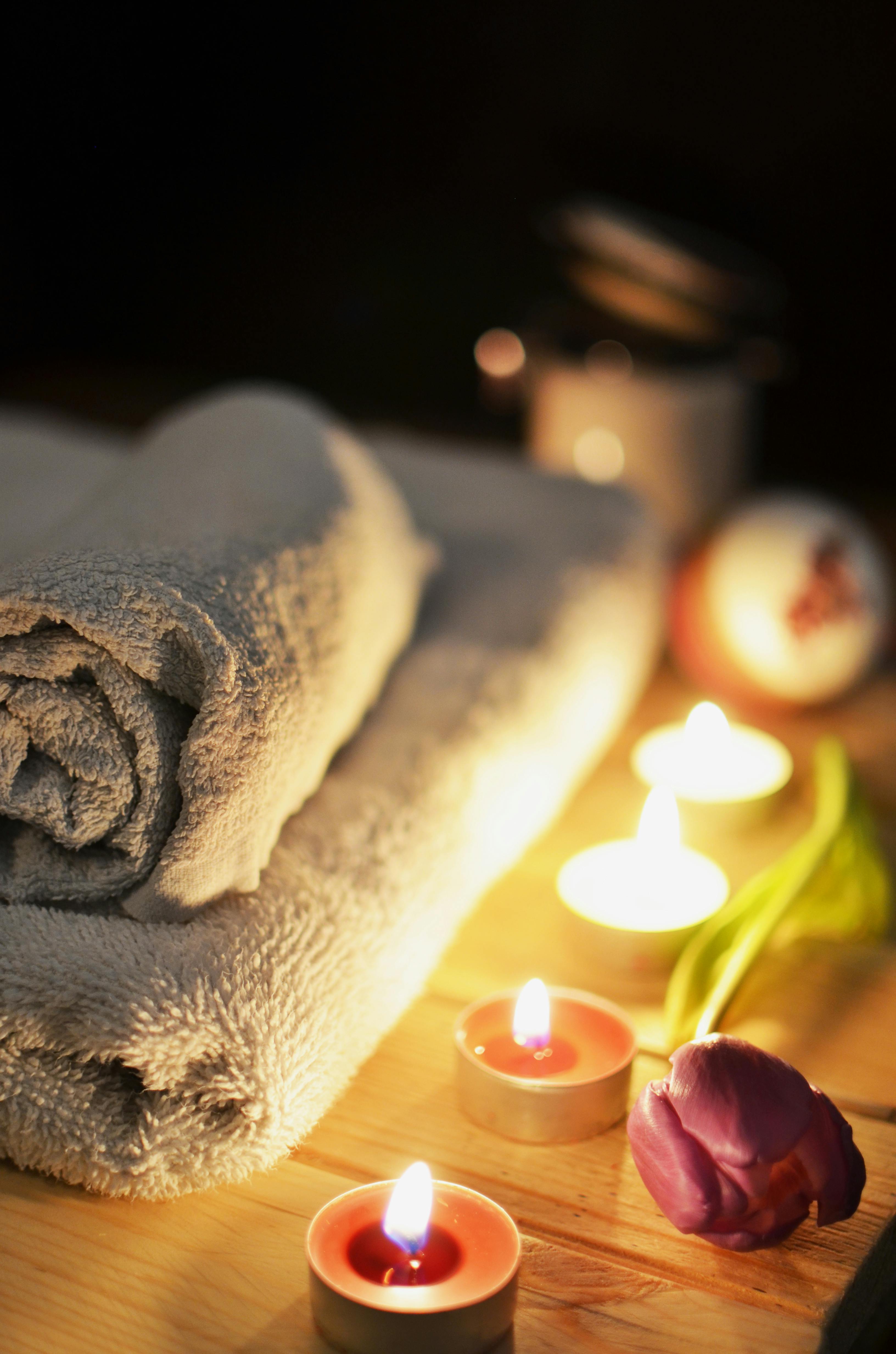 Relaxing spa atmosphere with candles representing calm lifestyle