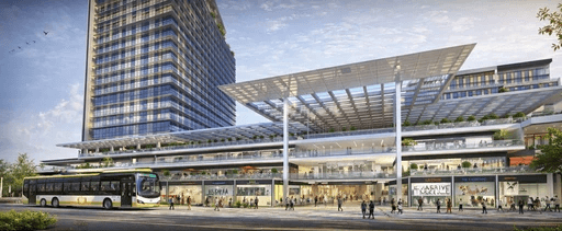 Modern glass facade commercial tower integrated with pedestrian boulevards and transit links