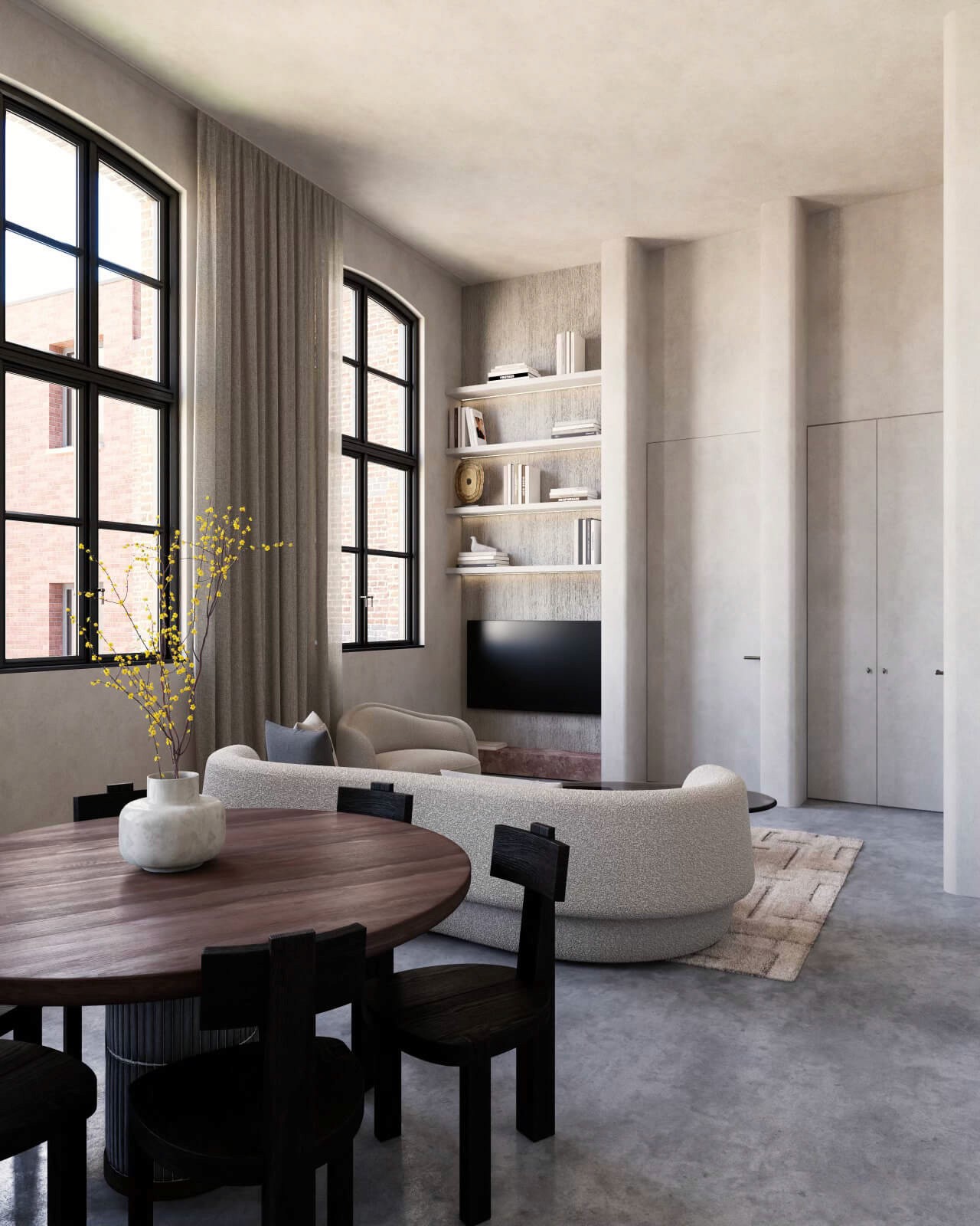 An open-plan living space with soft neutral furniture, wall-mounted shelves, and large windows inviting natural light into the room