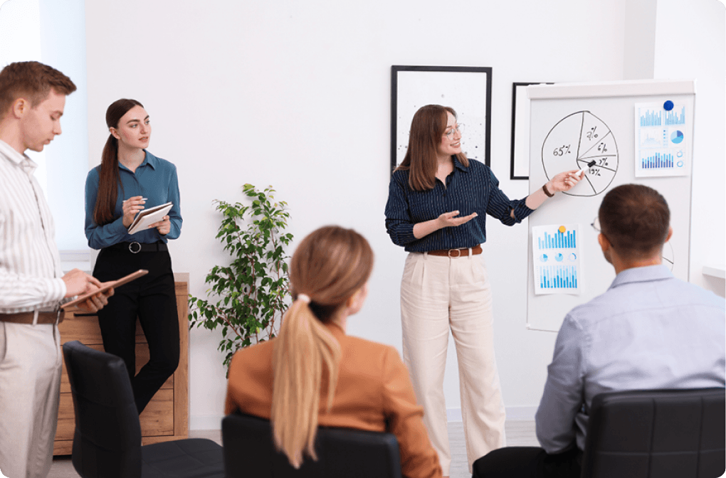 group of professionals engaged in leadership training session.