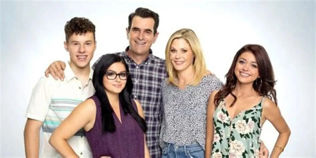 A still photo of Claire's family from Modern Family.