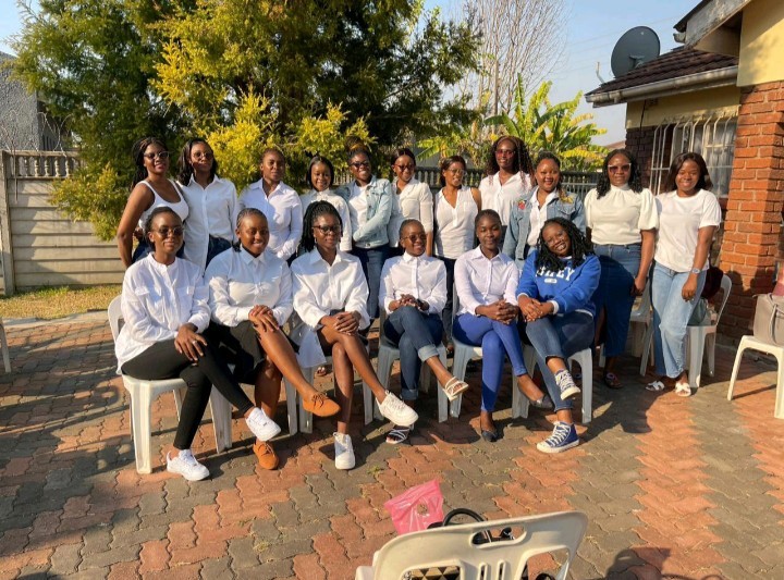 Close-up of evergreen foliage, showcasing vibrant green needles densely packed together.