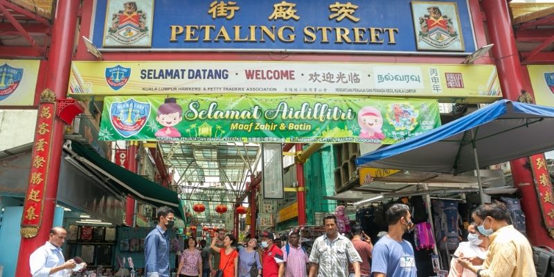 Tourists walking around Petaling Street, Kuala Lumpur 